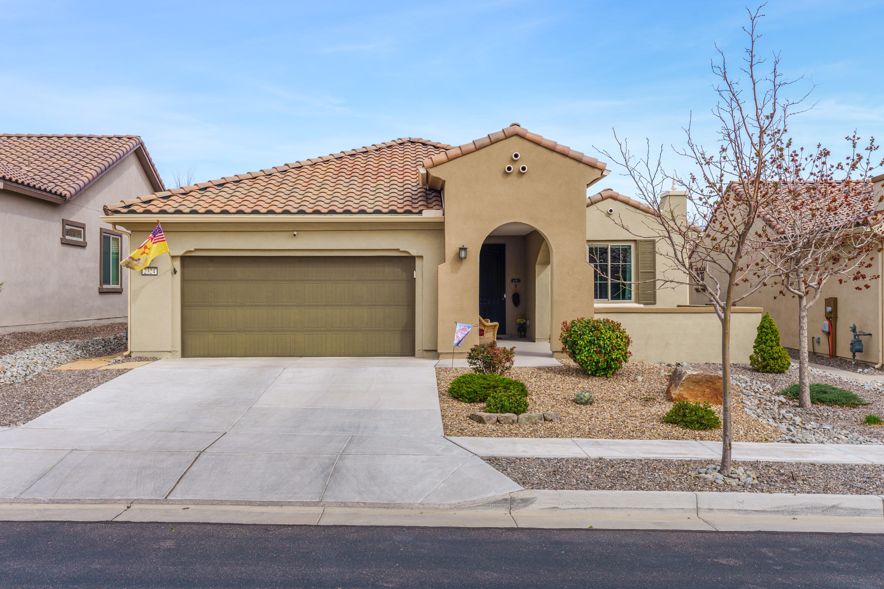 Beautifully Appointed One Story Home Located in the Exclusive Gated Active Adult 55+ Community of Del Webb Mirehaven!  Home has gorgeous wood look tile & new Luxury Vinyl flooring was recently installed in both Bedrooms as well as the Office/Den (could be a 3rd BR!).  Kitchen has a gas cooktop w/range hood, beautiful tile backsplash, pantry, built-in oven & microwave, large island and is open to the living & dining areas! Spacious Living room (15.7 x 21.2) has a beautiful corner gas fireplace with tile surround!  Custom Window Coverings throughout! Custom Landscaping w/pavers in the courtyard & backyard! Garages is Oversized with a 4' Extension & has Overhead Storage Racks plus a Workbench that stays! Owned Water Softener too! Home has been meticulously maintained!! Amazing Clubhouse!