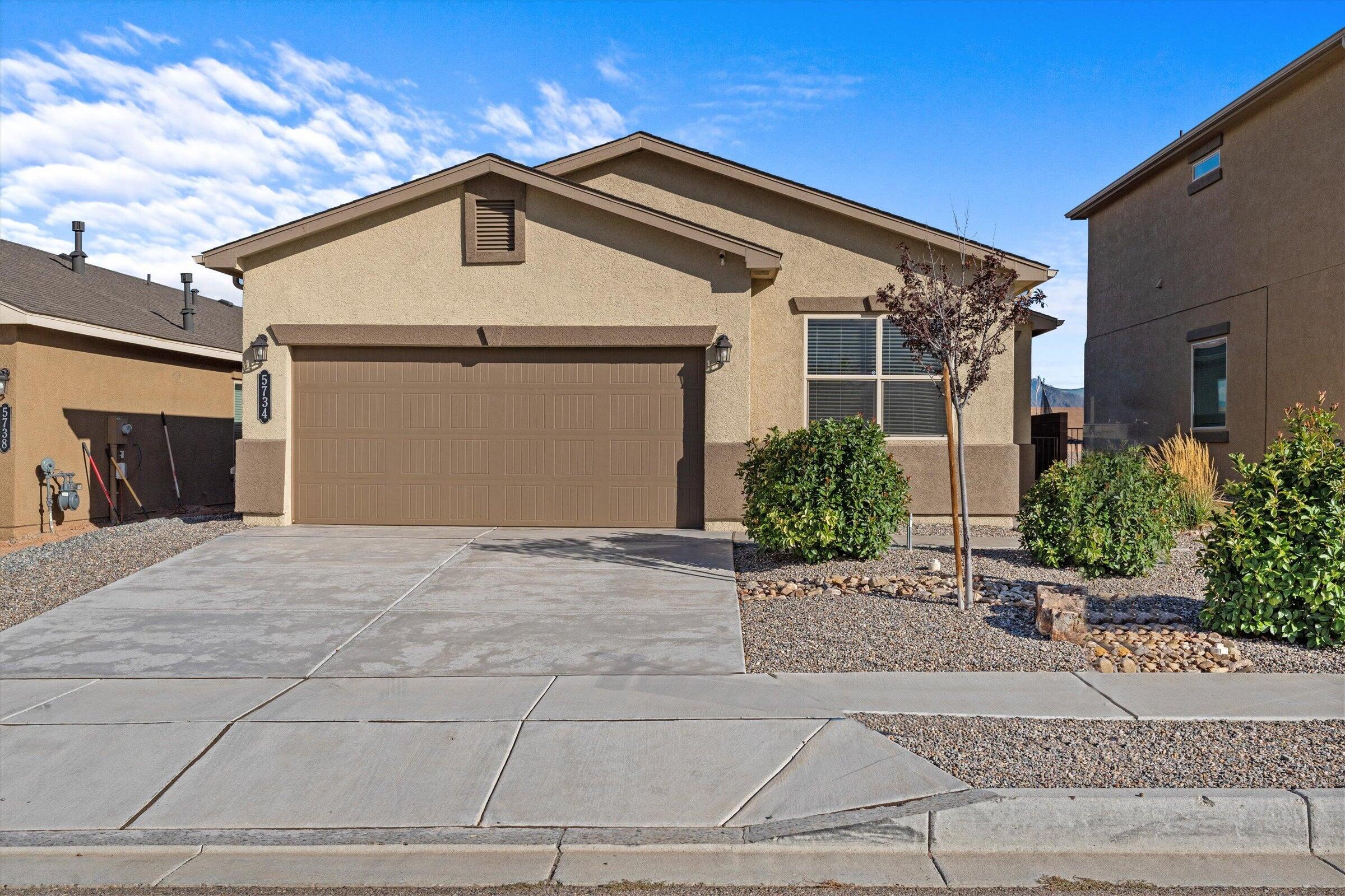 Prime Location with Stunning Views! Situated across from Enchanted Hills Park, this former D.R. Horton model home offers both style and functionality. Positioned on a west-facing lot, it provides breathtaking sunrise and sunset views. This three-bedroom, two-bathroom home also features a flex room, perfect as a fourth bedroom, home office, or study. Designed for modern living, the home includes custom window treatments, smart home technology, and high-end appliances, including a refrigerator, washer, and dryer. The front and back yards are fully landscaped with an irrigation system, while the garage and covered patio feature durable epoxy-coated flooring for a polished, long-lasting finish. Don't miss this exceptional opportunity--schedule your private showing today!