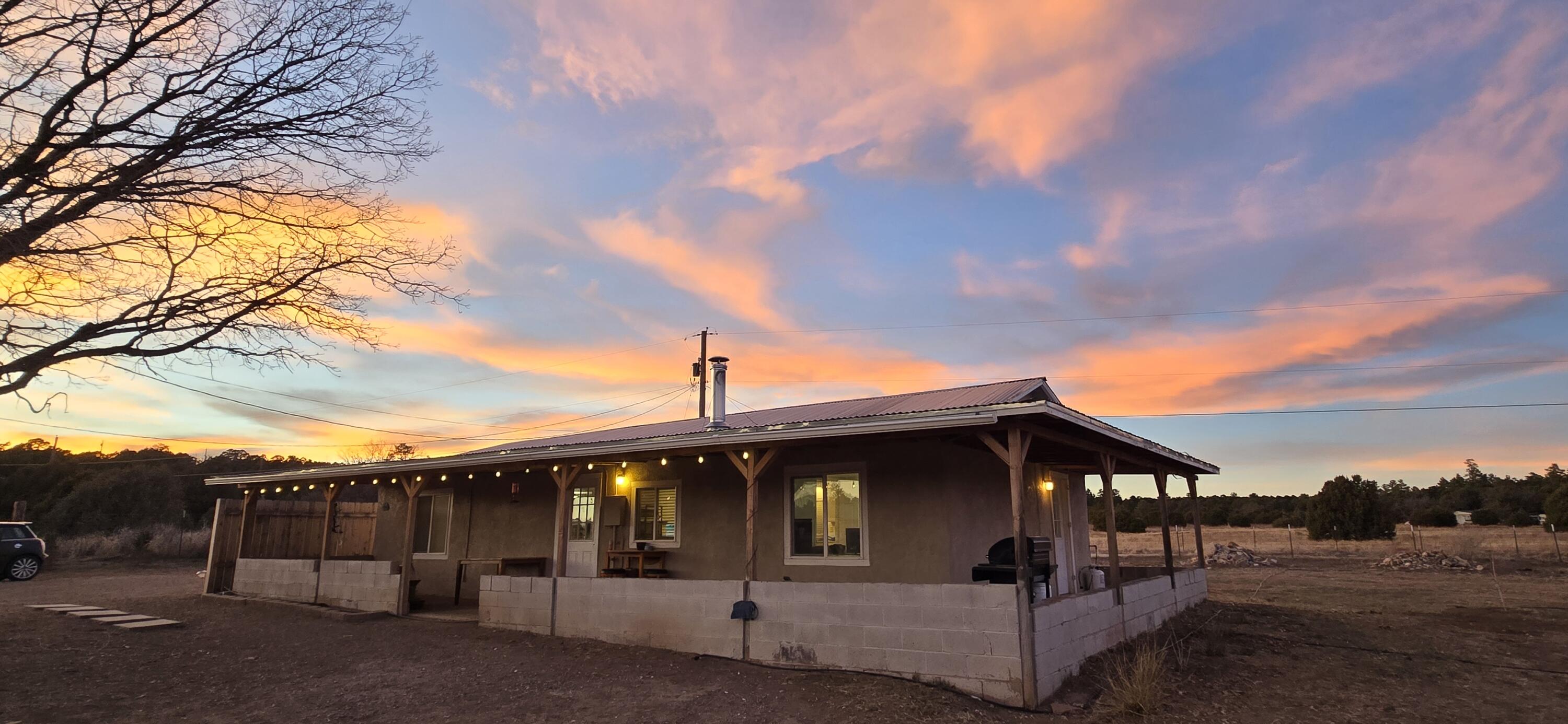 Come live your best life and enjoy all the seasons on this amazing property! This exceptional homestead offers a cozy two bedroom one bath home with a wood burning stove.  This rare property has both meadow and beautiful tall ponderosa pines trees. The 7.75 acre property is completely fenced , with two wells, two electric meters , two small barns, a stall and turn out area. Property is equine ready. Build your dream home,  farm, or have an amazing equine compound. So much potential...Make this dream yours today!