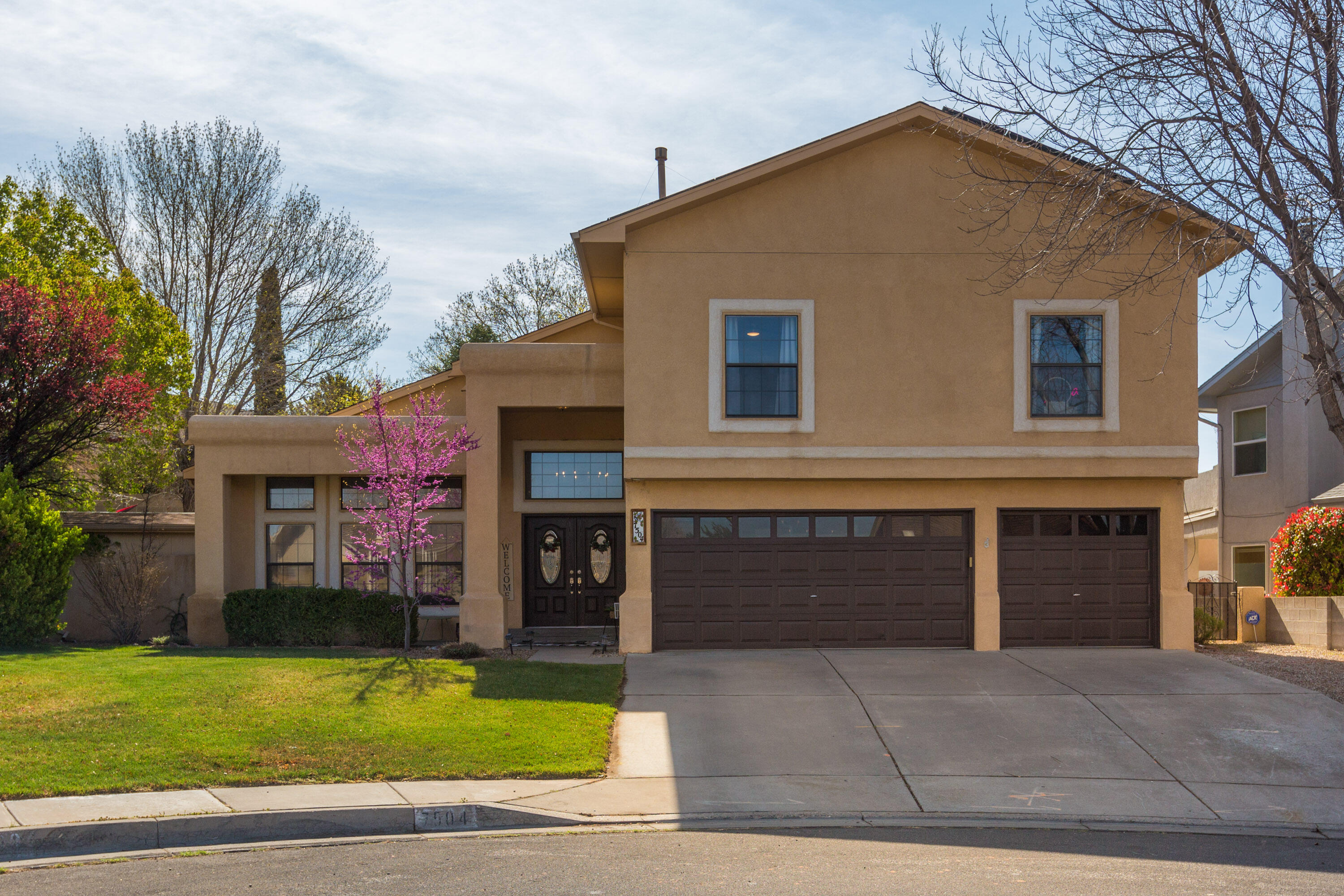 Welcome to this spacious and beautifully updated 4-bedroom + office,  3-bathroom home located in one of Northeast Albuquerque's most desirable neighborhoods. Boasting 3,000 square feet of well-designed living space, this home offers the perfect blend of comfort, style, and functionality. Step inside to find a bright and open floor plan with generous living areas, ideal for both entertaining and everyday living. The kitchen features updated finishes, storage, and a seamless flow into the dining and family rooms. Spacious bedrooms, including a luxurious primary suite with an en-suite bathroom featuring double vanity, soaking tub and oversized shower. Enjoy the backyard year round with covered patio, low maintenance turf/xeriscape. Save money with owned solar! Schedule a showing today!