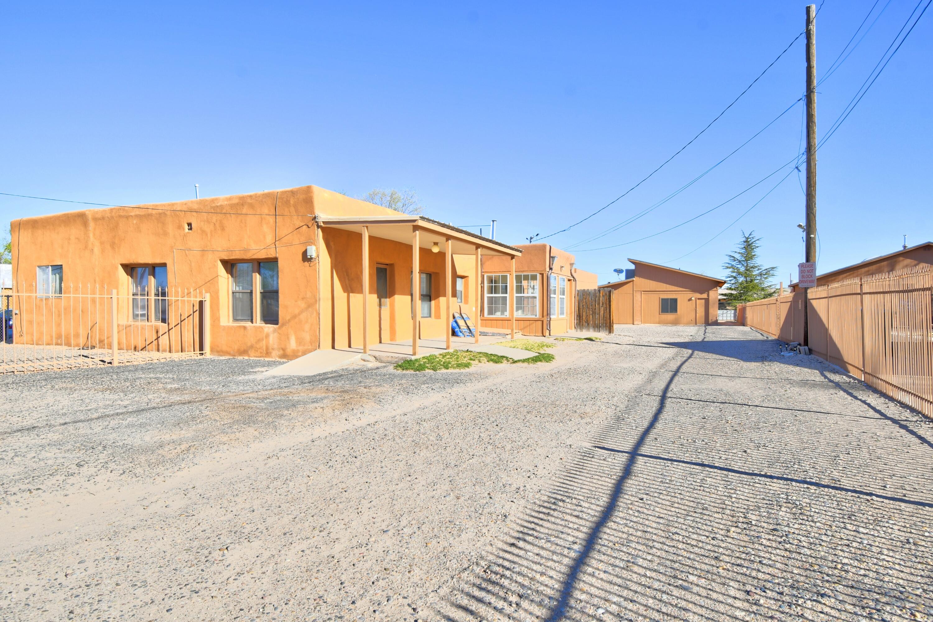 Discover a rare opportunity to own a property perfect for multigenerational living or income generation! This lovely property features 3 distinct units - allowing you to live in one while earning passive income from the others, or providing ample space for family to thrive together.Unit A - Original adobe haven with 3 bedrooms,1 bathroom and 1,106 sqft. It includes a laundry room, shed, and a cute screened-in porch.Unit B - Spacious 3-bedroom, 2-bathroom home with 1,327 sqft, featuring a laundry room and a large porch or carport - ideal for gatherings.Unit C - Cozy 2-bedroom, 2-bathroom home with a laundry room, perfect for guests or renters.All units have potential for individual yards. Units A & B are separately metered & Unit C can be connected separately.