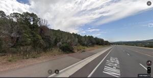 Nice building lot located along North 14 in Cedar Crest. Properties in the area consist of custom homes and dwellings of various sizes. This lot currently does not have access from North 14 but homes adjoining this lot do have driveway access. Building your dream home in a convenient location!