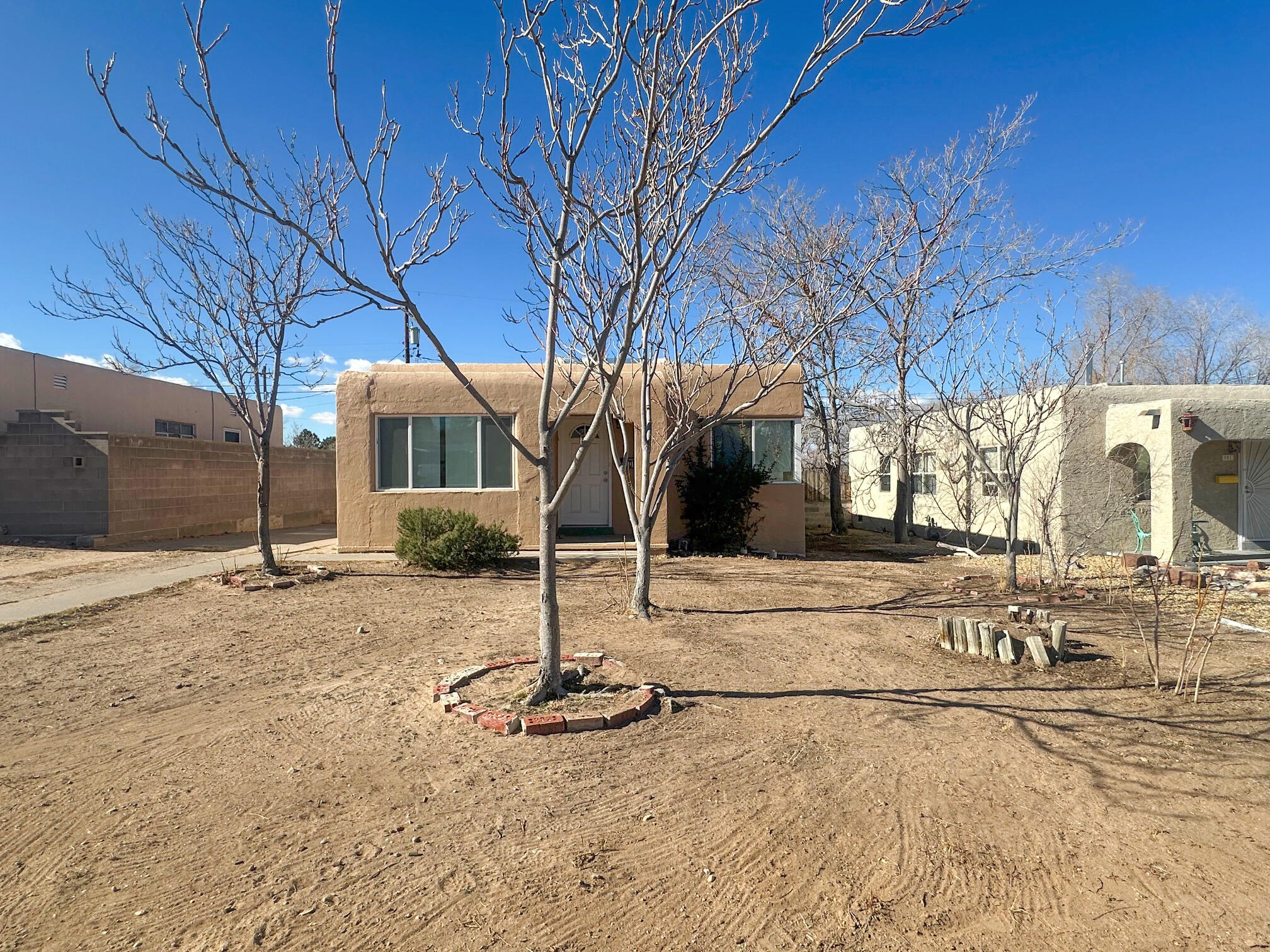 This 3 bedroom, 1 bath home has a functional layout and is located close to UNM and Kirtland Air Force Base. 1 car detached garage and a low maintenance yard with room for a garden.
