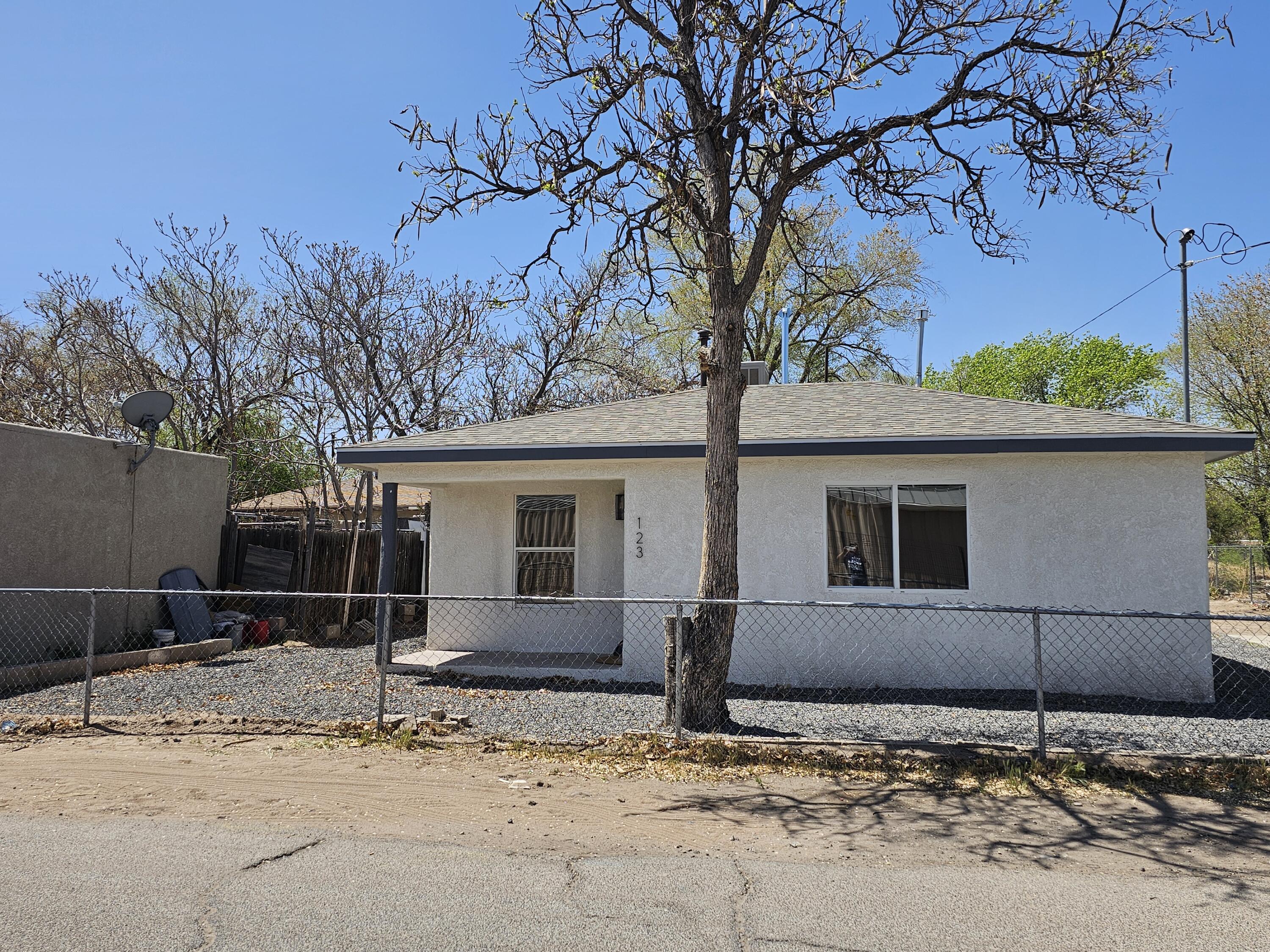 Updated beautiful home ready to go! Great stater home 2 beds 1 bath. Fresh paint inside and out, new fixtures and lighting. Updated laminate wood floors throughout. New cabinets sink and appliances. New roof, sits on a huge lot with backyard access and plenty of parking for everything you need.