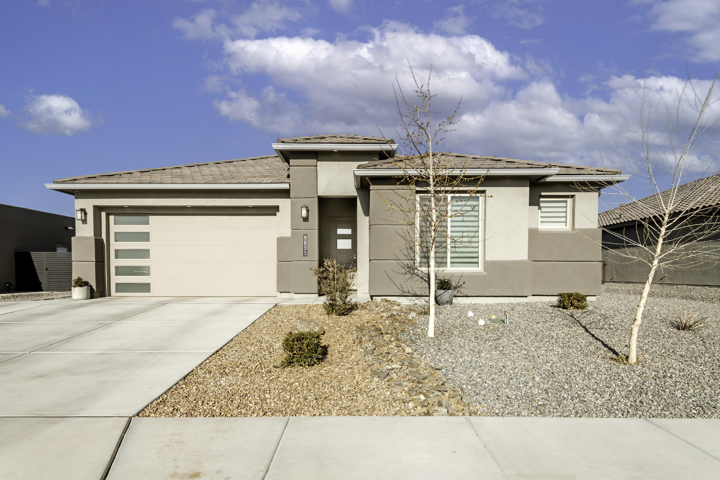 Welcome to this stunning & highly upgraded DR Horton 4 bedroom + office/study home barely 2 years old in Volcano Vista HS district. Dbl, massive sliding glass doors invite you to the  completely finished backyard on an oversized lot w an inviting inground pool & built in hot tub that will entertain all your guests. Every room in this home is sure to impress w/upgrades galore from decorative tile, lighting packages, floating vanities, electric window blinds & high end finishes. The chef's kitchen boasts a waterfall stone countertop island w plenty of seating, dbl undermount sink, huge pantry, accent lighting & soft close cabinetry. The 5 burner gas cooktop w exhaust hood & pot filler is ready for your next party! The elegant en suite primary bath