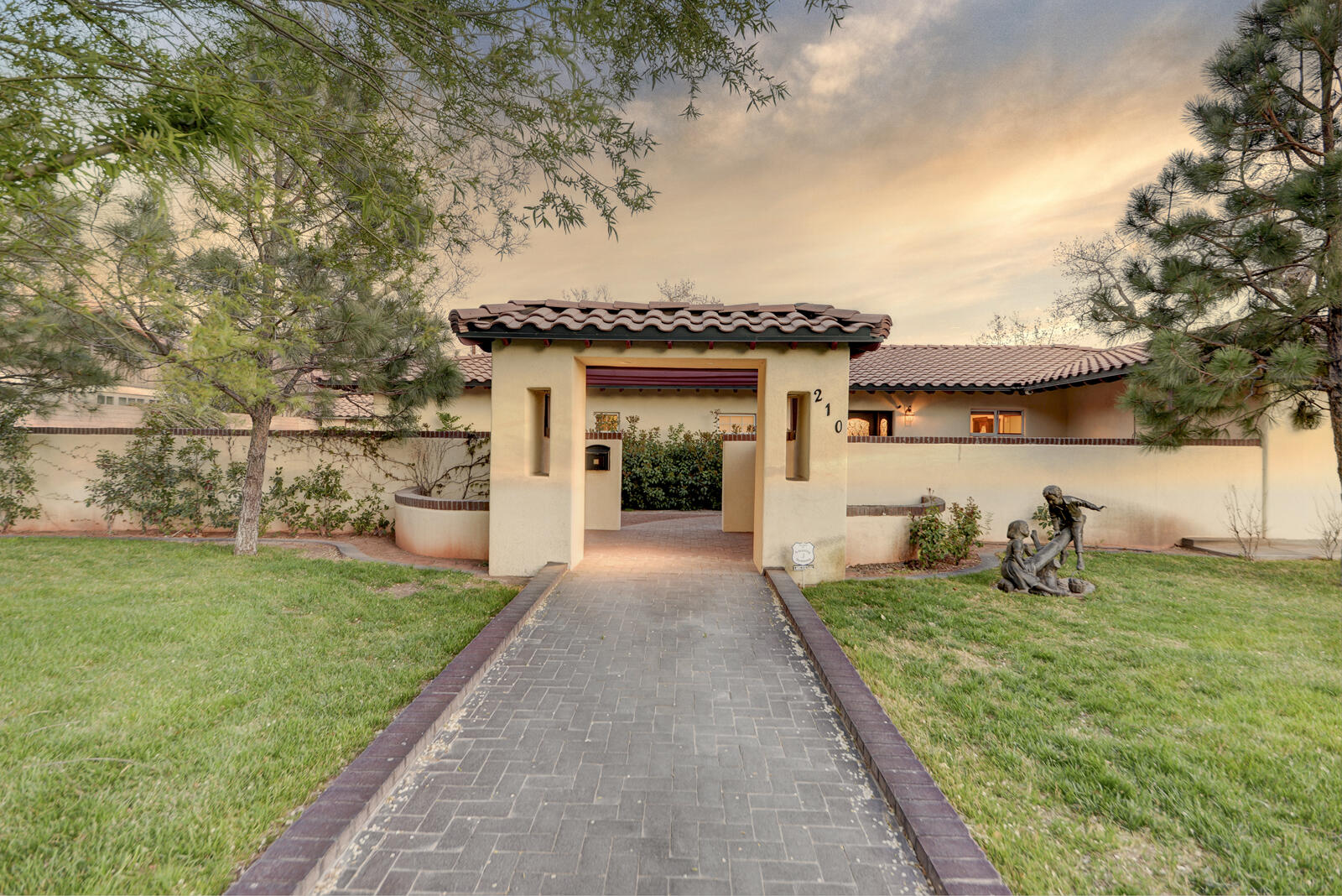 Nestled in the prestigious Alb Country Club, this exquisite one-story Mediterranean estate occupies a spacious .49 acre corner lot, complete with well irrigation and surrounded by lush vegetation and parks. The property features a breathtaking chefs kitchen, complimented by a Butlers Pantry. The outdoor oasis includes a swimming pool & hot tub. The home is adorned with beautiful custom cabinetry throughout, emphasizing its elegance. A versatile game room offers potential for additional bedrooms, while ample storage, including a dedicated doggie room and craft room, provides ultimate convenience.  Revel in the stunning views that enhance the allure of this luxurious property. CAST IRON art works do not convey.