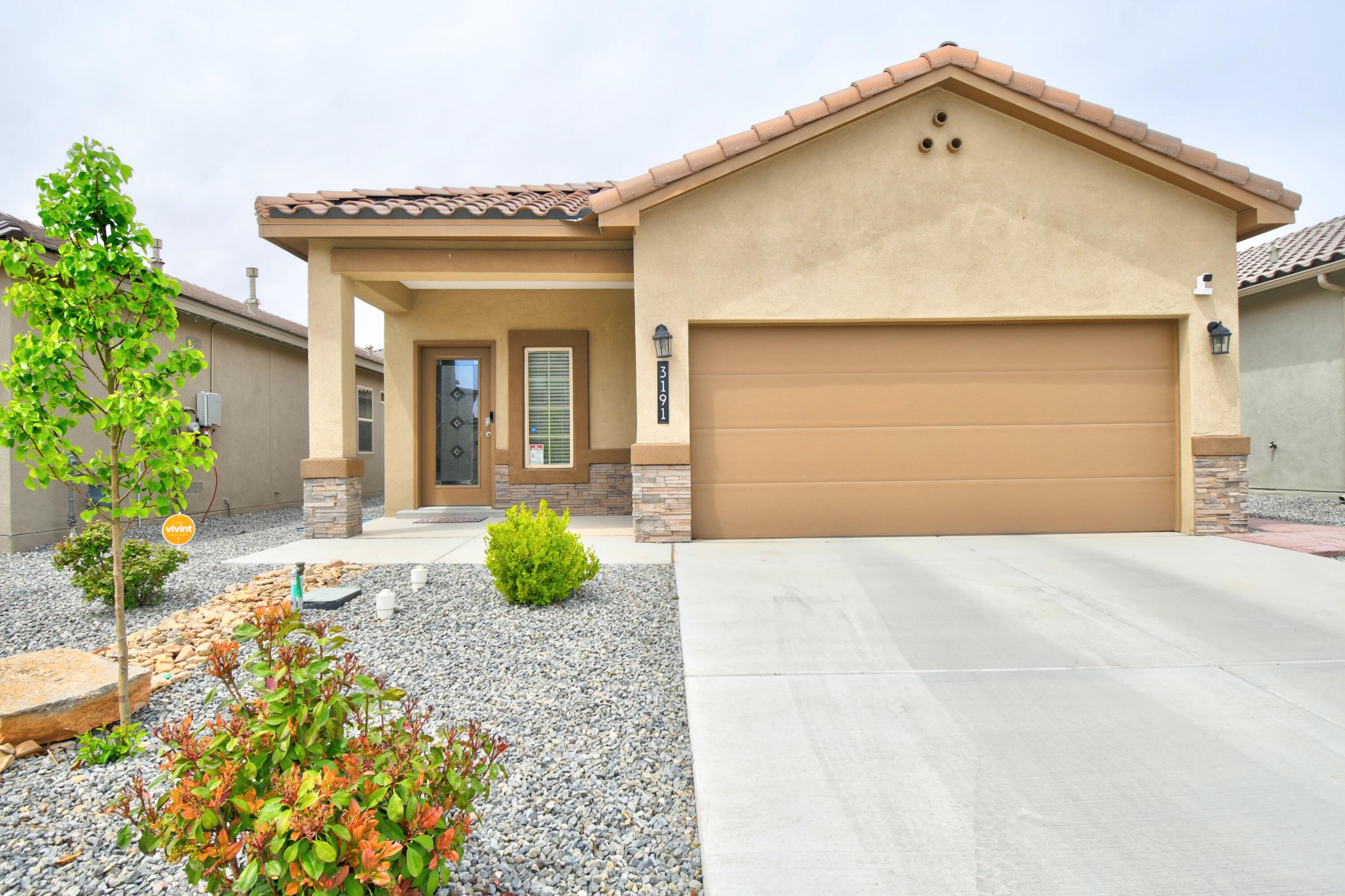 Welcome to this stunning 2-year-old contemporary smart home in the sought-after Los Diamantes Subdivision! The popular Sierra floorplan offers single-level living with a spacious layout and split-bedroom design. Enjoy a long foyer that opens to the kitchen, living, and dining areas--perfect for entertaining. The kitchen boasts a large island, walk-in pantry, stainless steel appliances, and generous counter space. The primary suite features a huge walk-in closet and private bath. Beautifully landscaped backyard is ready to enjoy. Refrigerator, washer, and dryer all stay!  Don't miss this amazing deal!  It's the perfect place to hang your heart!  Conveniently located near parks, schools, hospital, shopping, dining.