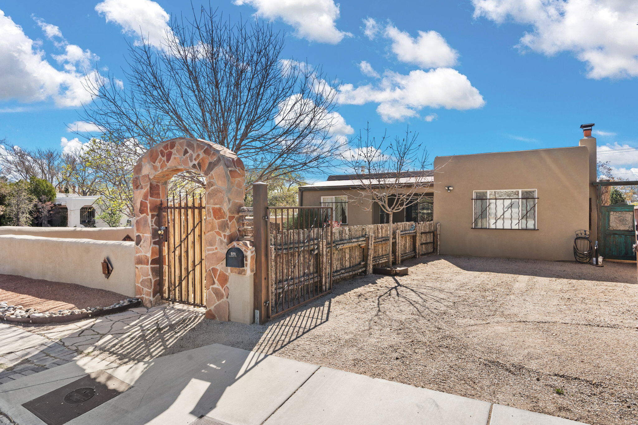 Exceptional & Unique Home with Guest and or IN-LAW Quarters! Step into a beautifully remodeled 3-bedroom, 2-bath residence that exudes character, craftsmanship, and thoughtful design in every detail. This one-of-a-kind home offers a rare blend of charm and functionality, ideal for both everyday living and entertaining.Included is a fully independent GUEST or IN-LAW quarters featuring 1 bedroom, a stylish and modern kitchen, a .75 bath, and a spacious living area -- perfect for extended family, guests, or as a lucrative rental opportunity.Enjoy the professionally landscaped yard complete with a dedicated garden area and a luxurious hot tub -- the ultimate retreat for relaxation or social gatherings.  MUST SEE to appreciate!  Attention to DETAIL!