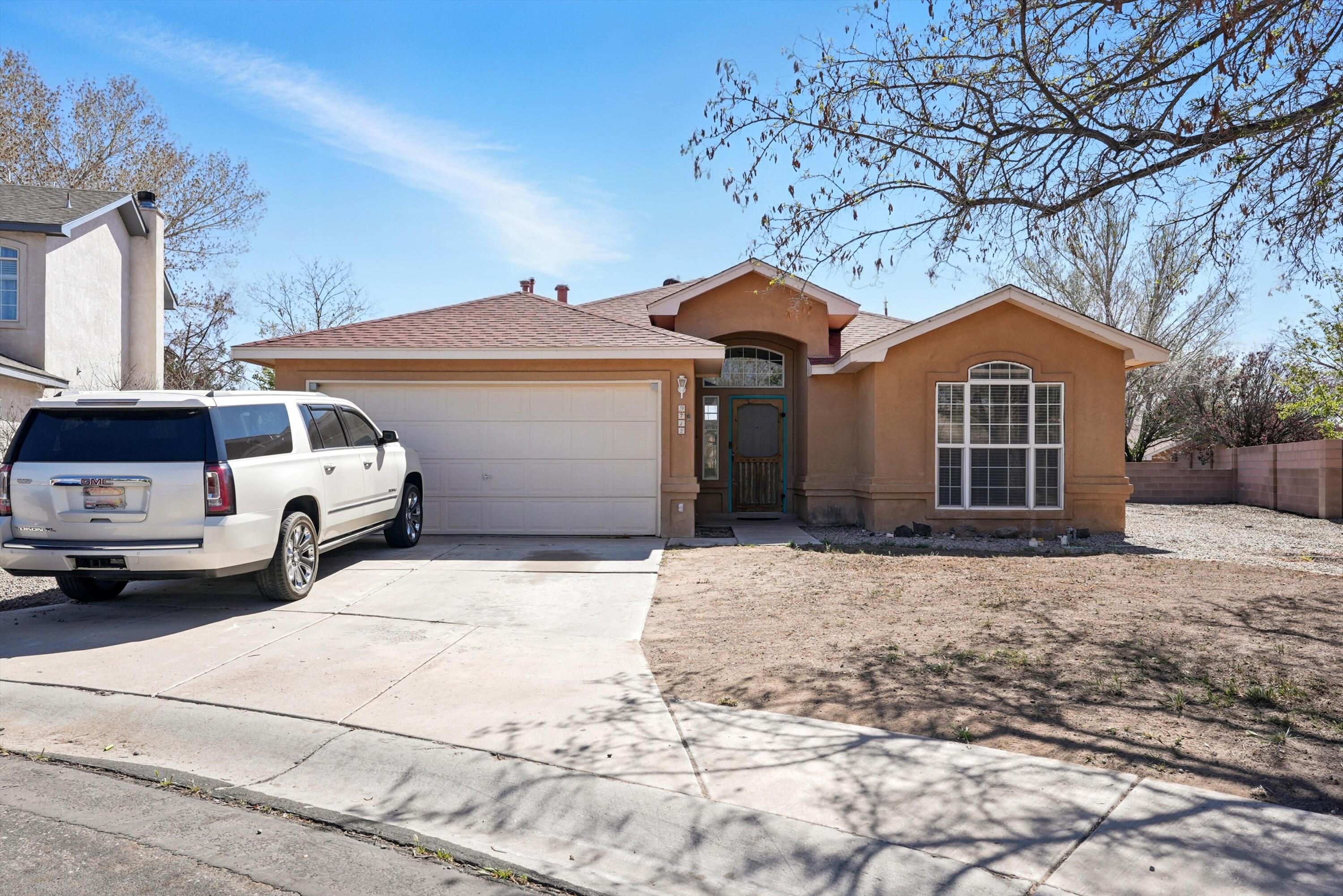 This  beautiful home offers modern living in a peaceful cul-de-sac.  Three bedroom, two bath.  On a large lot, back yard access is also an option.  The home features a cozy gas fireplace, and a great location. Come see this one!!