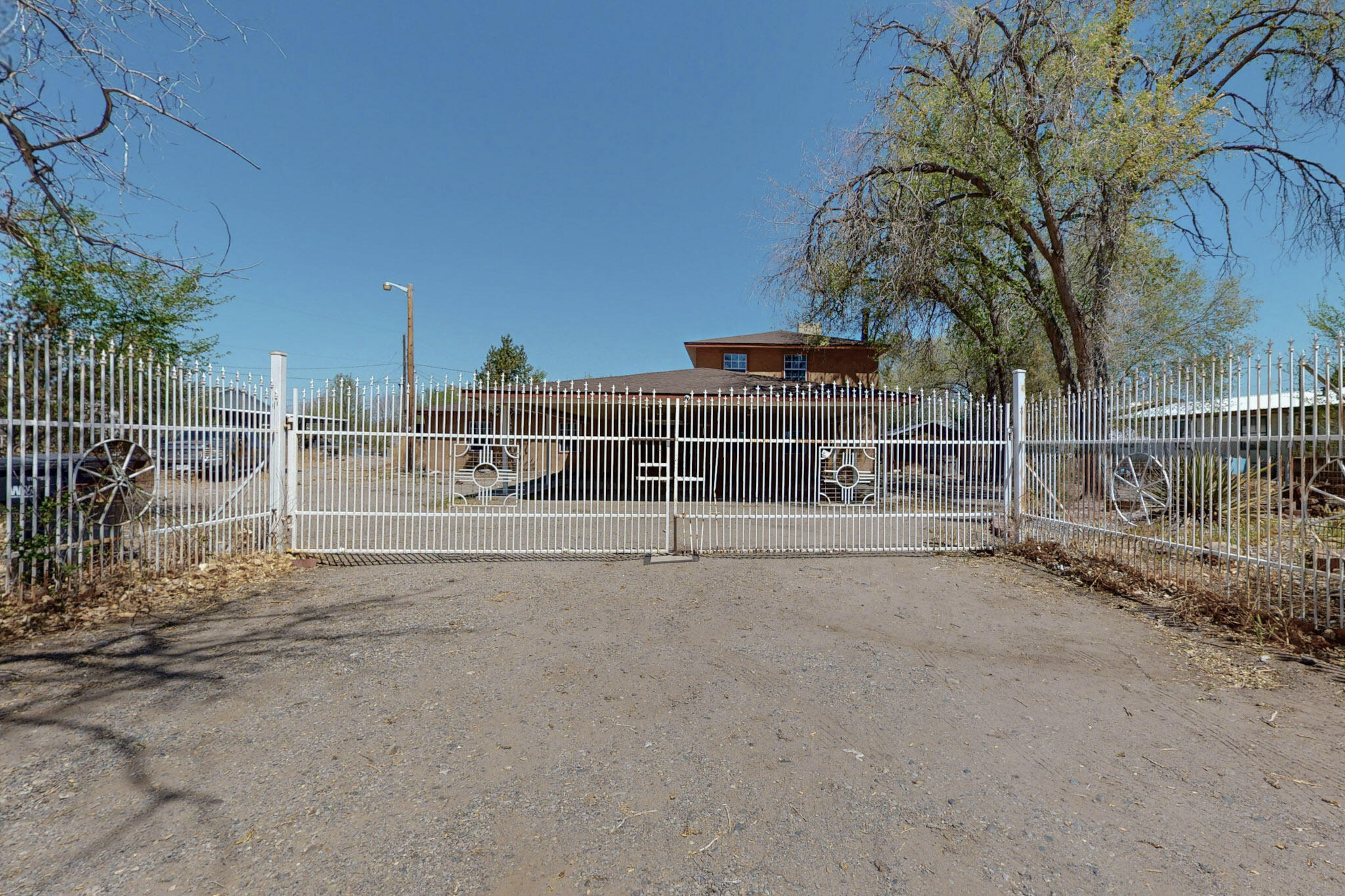 Welcome to this generously sized 4-bedroom, 3 full bathroom home nestled on almost half an acre of land with endless potential. With over 3000 square feet of living space, this home offers room to grow, entertain, and make it your own. Inside, you'll find two large living areas, one of which features a built-in wet bar--perfect for hosting guests or creating a cozy retreat. Home features an updated roof, giving you peace of mind as you plan your personal touches. Don't miss this opportunity to own a large, well-laid-out home on almost half an acre--bring your ideas and make it yours!