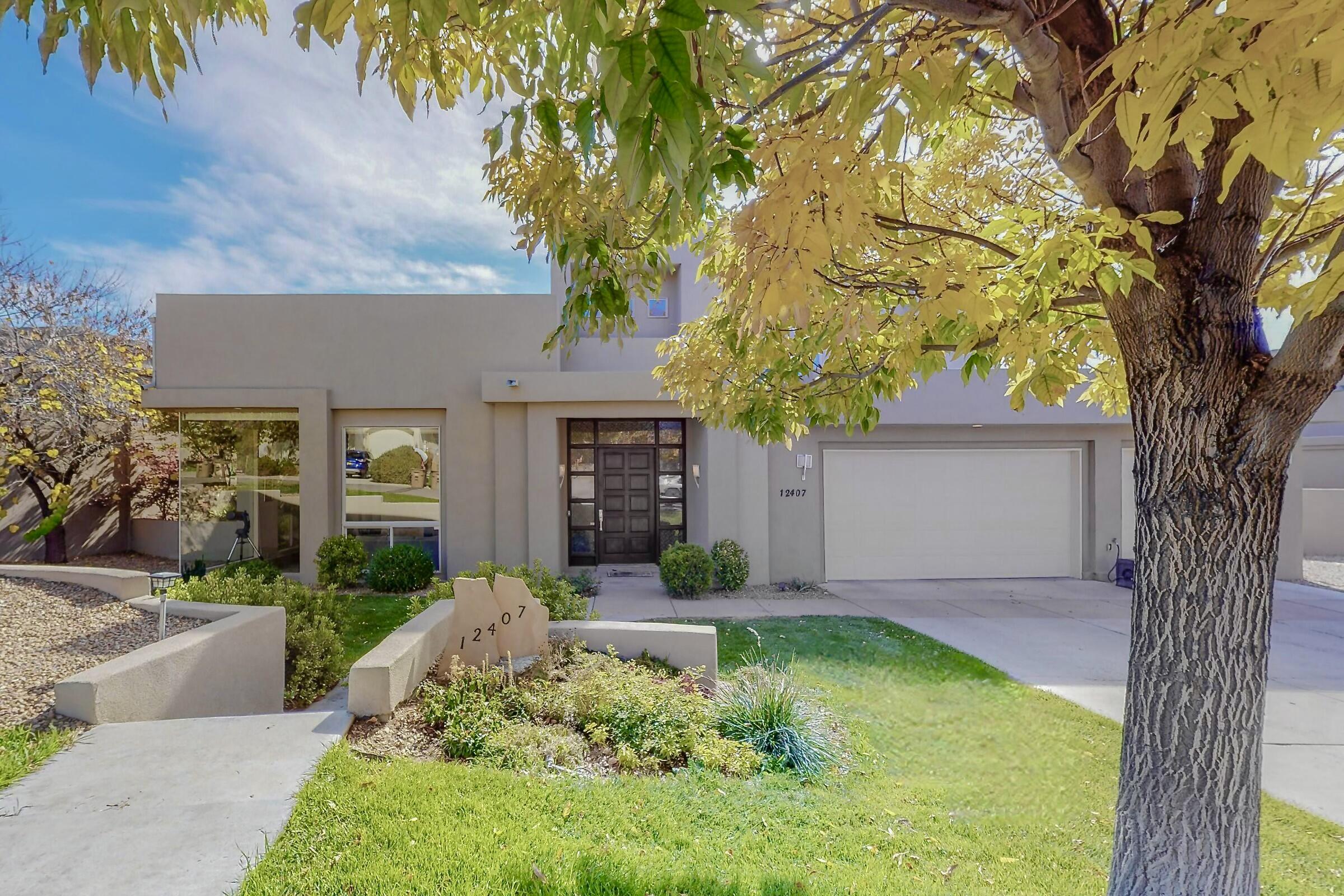 Introducing an impressive contemporary residence in the highly desirable Primrose Pointe community. Step into this stunning home, featuring astonishing 4,900 square feet of luxurious living space with soaring ceilings, and elegant travertine flooring. The gourmet kitchen is a chef's dream, equipped with cherry wood cabinetry, granite countertops, stainless steel appliances, island with breakfast bar and a Sub-Zero refrigerator. This expansive home comprises five bedrooms, including two master suites--one conveniently located on the main level. It offers two spacious living areas enhanced by a surround sound audio system. The upstairs master suite features a private balcony, accompanied by two additional rooms that can serve as an office, exercise area, playroom, or home theater.
