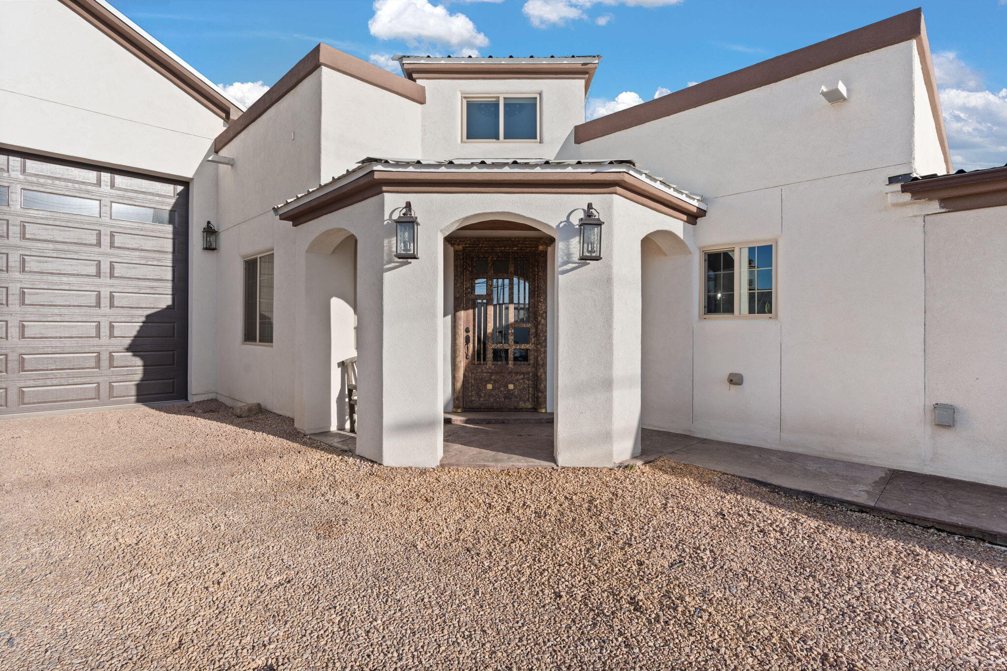 Stunning home with large oversized garage big enough to park an RV and a boat and cars in all at the same time! Views of the city lights at night, perfect work/home set up.From the oversized doors to the decorative concrete to the chefs kitchen to the covered patio to the massive garage, this home lives large. A definite must see!
