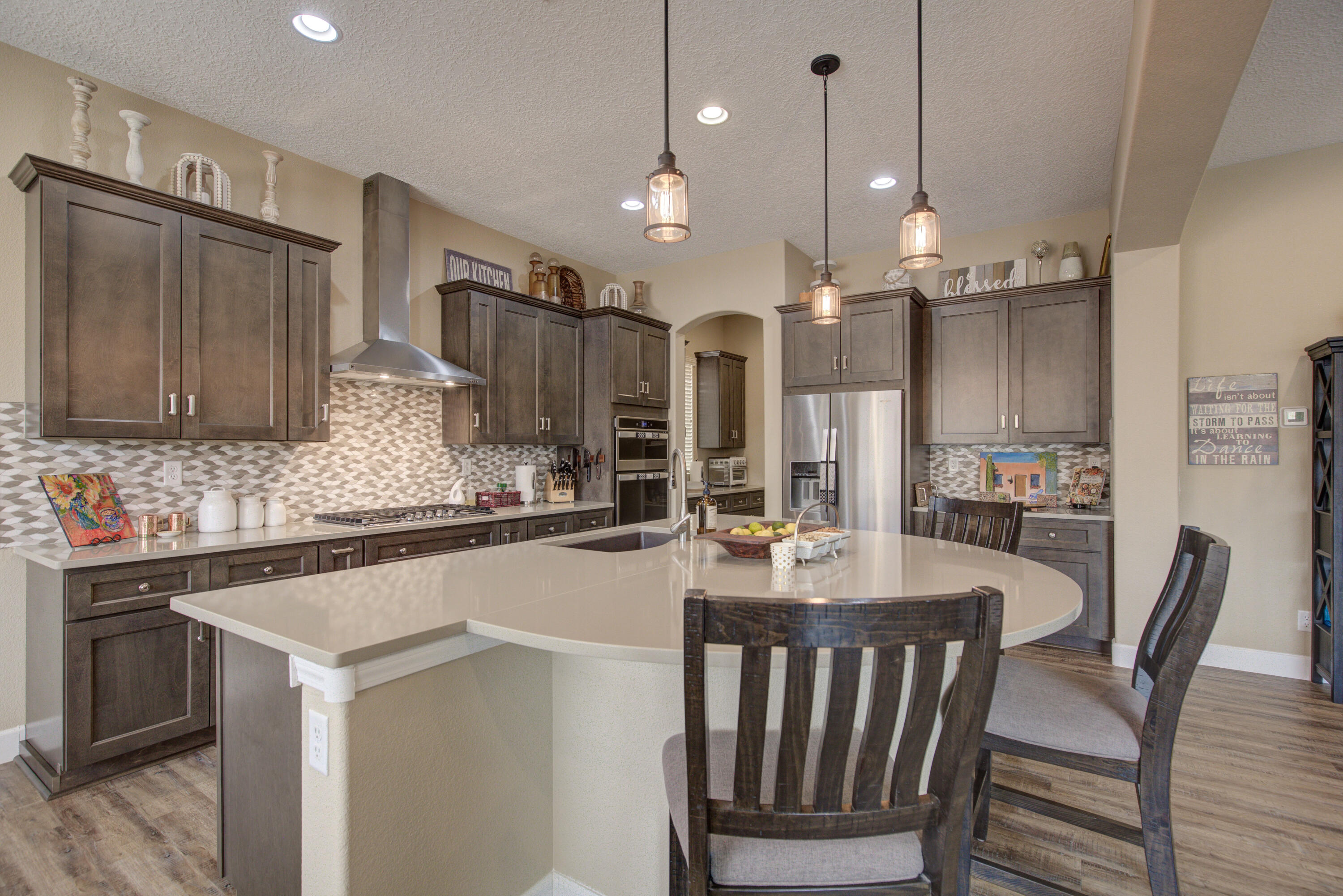 Experience upscale living in this expansive Pulte home located in Mirehaven's exclusive 55+ community. Thoughtfully designed for both comfort and style, this residence features 2 bedrooms, a dedicated office, and 2 inviting living areas--including a luxurious owner's suite and a private second suite--plus 3 bathrooms.  The gourmet open-concept kitchen is a chef's dream, complete with generous counter space, upgraded cabinetry, soft-close drawers, a walk-in pantry, and more. The primary suite showcases a spa-like bathroom and an impressive walk-in closet.  Step outside to beautifully designed outdoor living areas, featuring both covered and open patios--perfect for relaxing or entertaining.  A must-see property that combines elegance with everyday ease.