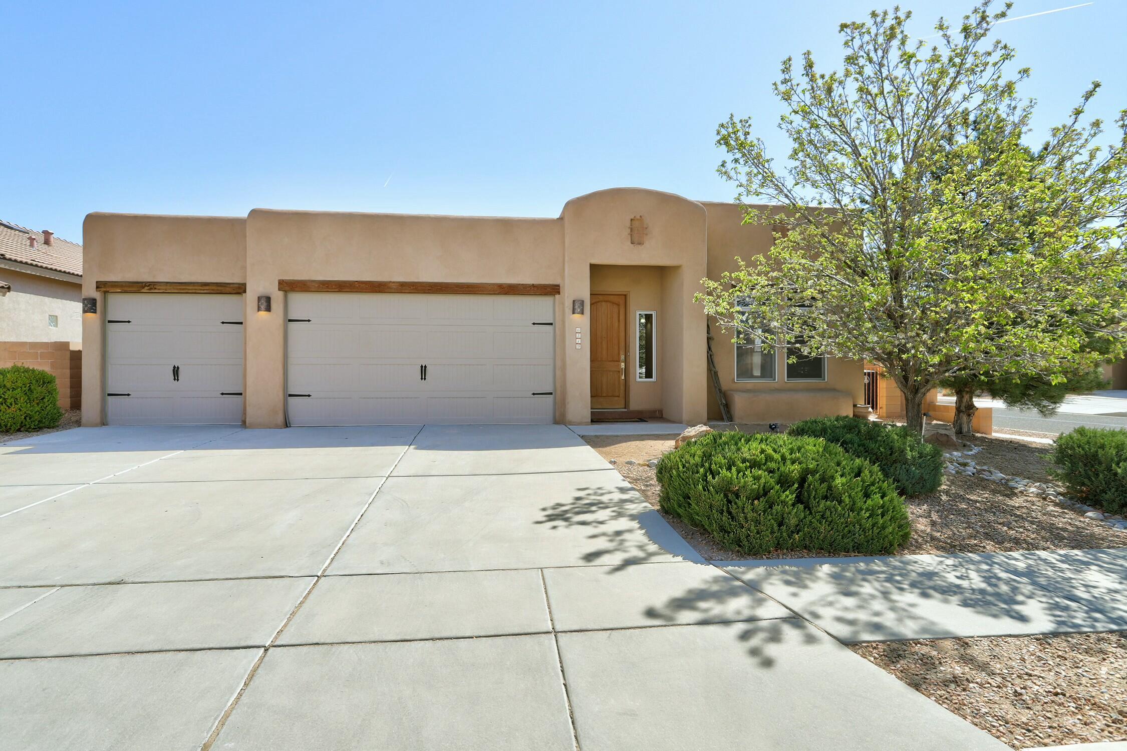 With, over 2000 square feet, this bright 3 bedroom, 2 bathroom home with a large 3 car garage is ready for you. With ten foot ceilings and custom touches throughout the home this home has grand and comfortable feel. A dining room/living room combo greets you as you enter the home. A bright and open kitchen follows with an island, an eat up bar and cabinetry and counter space surrounding the entire kitchen giving it  plenty of space and storage. The family room with a custom wood vega ceiling and a gas fire place giving a perfect combo of comfort and design. The Primary bedroom has all the space you could ever hope for. You wont believe the size of the walk-in closet and the attached full bathroom makes the primary bedroom a retreat onto itself.