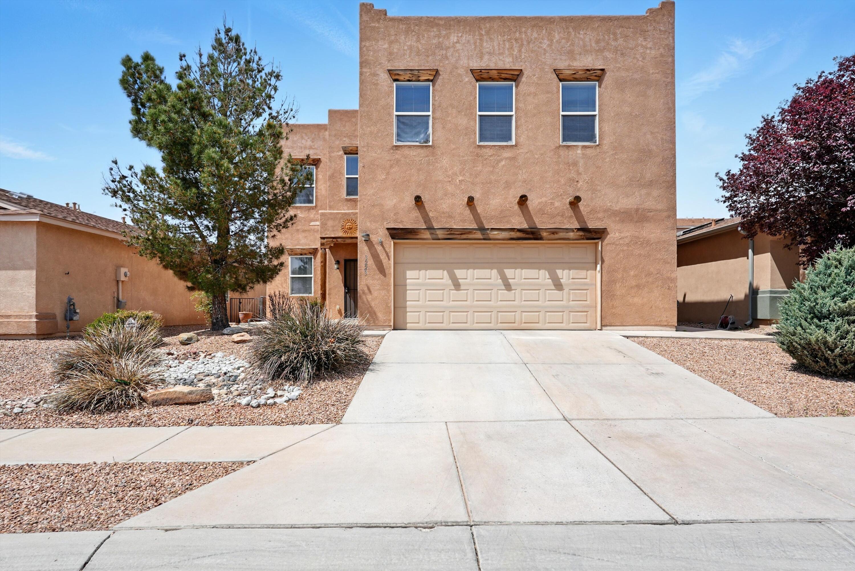 Welcome to this spacious 3-bedroom, 3-bath home offering comfort and functionality. The lower level features an open-concept layout with a generously sized living room and kitchen--perfect for entertaining or simply relaxing at home. Upstairs, you'll find a sizable loft along with a large primary suite and walk in closet. Enjoy the oversized two-car garage, offering plenty of space for vehicles, storage, or a workshop setup. Located just across the street from a beautiful park for your recreational fun and nice views of the Sandia Mountains is always a bonus. Whether you're hosting gatherings or enjoying a quiet evening, this home has the space and features to suit your lifestyle. Don't miss your chance to make it yours!