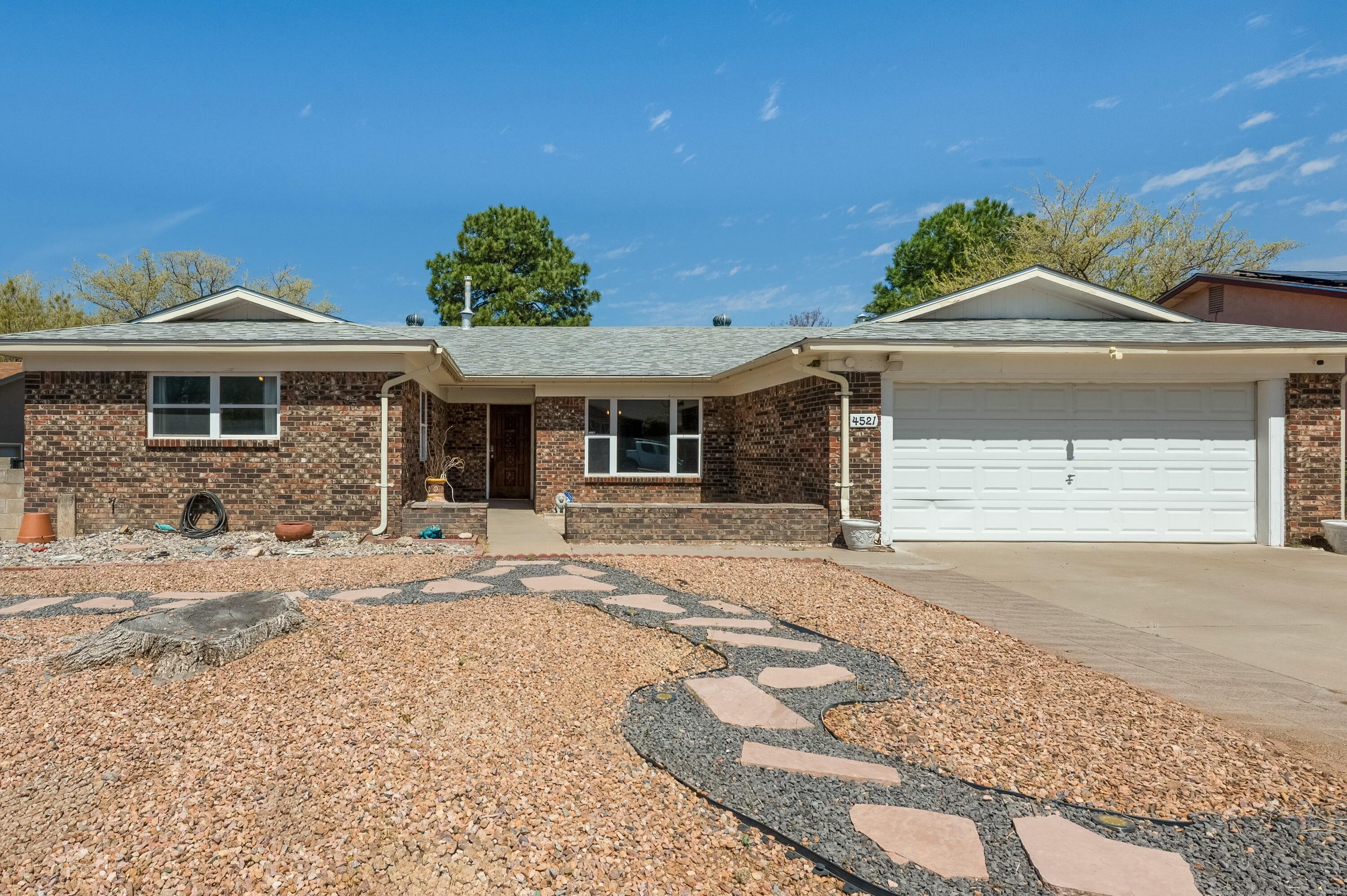 Come see this lovely 4 bedroom 2 bathroom home in the NE heights that features a wonderfully unique floor plan with two living spaces, formal dining room, a beautifully renovated kitchen, large laundry room, refrigerated air, wood burning fireplace and handicap accessible. Beautiful backyard has a deck, shed and low maintenance landscaping in both the front and backyard. Minutes away from some of the best hiking trails in the Foothills and so much more. Let's make this your forever home!