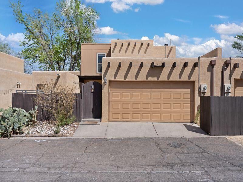 Welcome to your new home! This beautifully maintained 3-bedroom, 3-bathroom townhome features a 2-car garage and an inviting blend of comfort and style. Step inside to discover an open-concept living area enhanced by new laminate flooring and a cozy fireplace, perfect for relaxing or entertaining guests.The heart of the home--your kitchen--has been thoughtfully updated with modern cabinets, sleek countertops, and stainless steel appliances, offering both functionality and style. Upstairs, you'll find freshly installed carpet throughout the upper level, creating a warm and plush feel in the bedrooms and hallway. Enjoy the outdoors in your private backyard, which offers direct access to a tranquil community green space--ideal for morning coffee, evening strolls, or a little extra room for pets