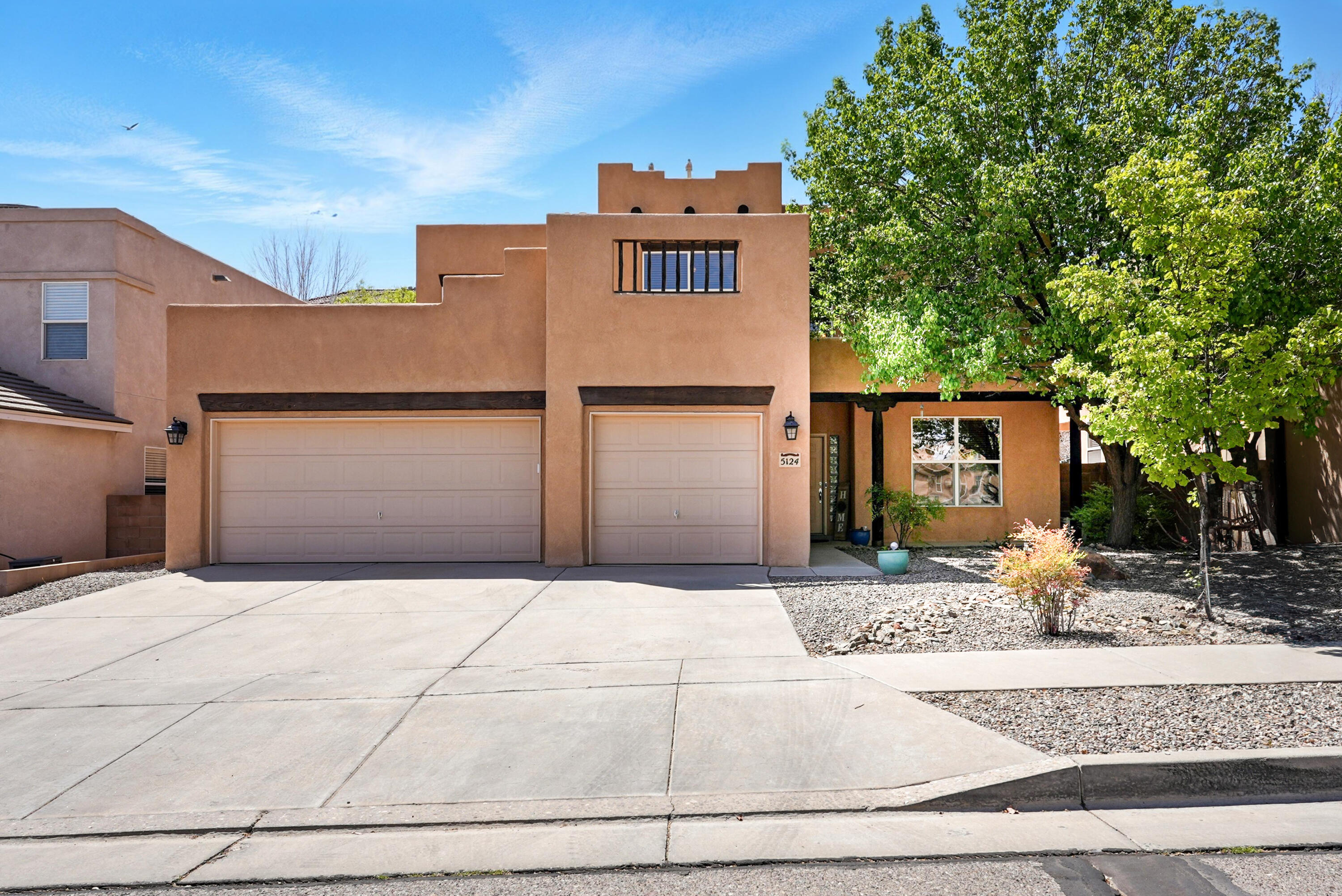 Welcome to a beautifully updated and expansive 3,406 sq ft home located in the sought-after Stonebridge community of Albuquerque. Sitting on a 7,052 sq ft lot, this home perfectly blends space, comfort, and character in a fantastic location. This well-designed home features 5 spacious bedrooms and 3 full bathrooms, including a full bedroom and bath on the main level -- perfect for guests or multigenerational living. Enjoy multiple living areas, a large game room, flex room or a theater room offering plenty of space to relax and entertain.The heart of the home is a beautifully appointed kitchen with stainless steel appliances, including a double oven, cooktop, microwave, and refrigerator -- perfect for any home chef. Other standout features include