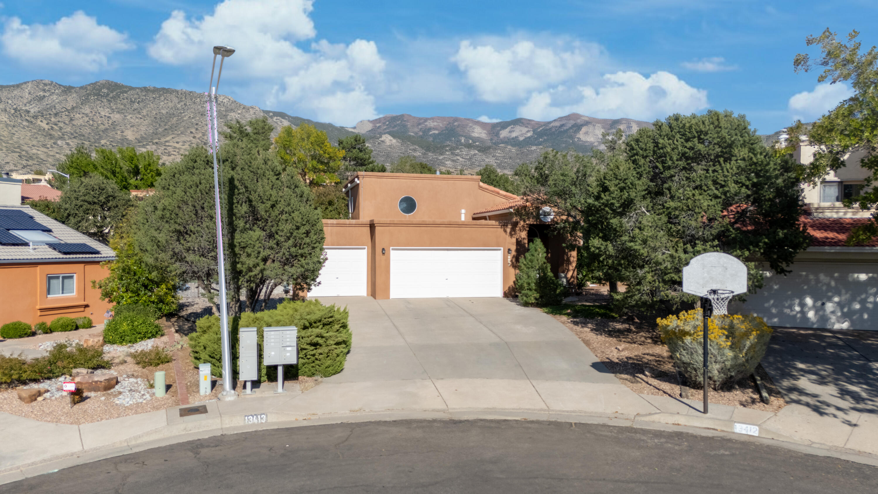 Welcome to 13413 Pinnacle Court NE, a beautifully updated 3-bedroom, 2-bath home with a 3-car garage, nestled in the highly desirable Foothills of Albuquerque. This home offers the perfect combination of modern comfort, functionality, and an unbeatable location.Located in the picturesque Embudo Canyon neighborhood, this home is just a stone's throw away from scenic hiking and biking trails, while also providing easy access to all amenities, including shopping, dining, and entertainment. It's a short drive to Kirtland Air Force Base and Sandia Labs, making it ideal for those working in these key Albuquerque locations.This well-maintained home is ready for you to move in and enjoy, with the added benefit of numerous updates and transferable warranties.