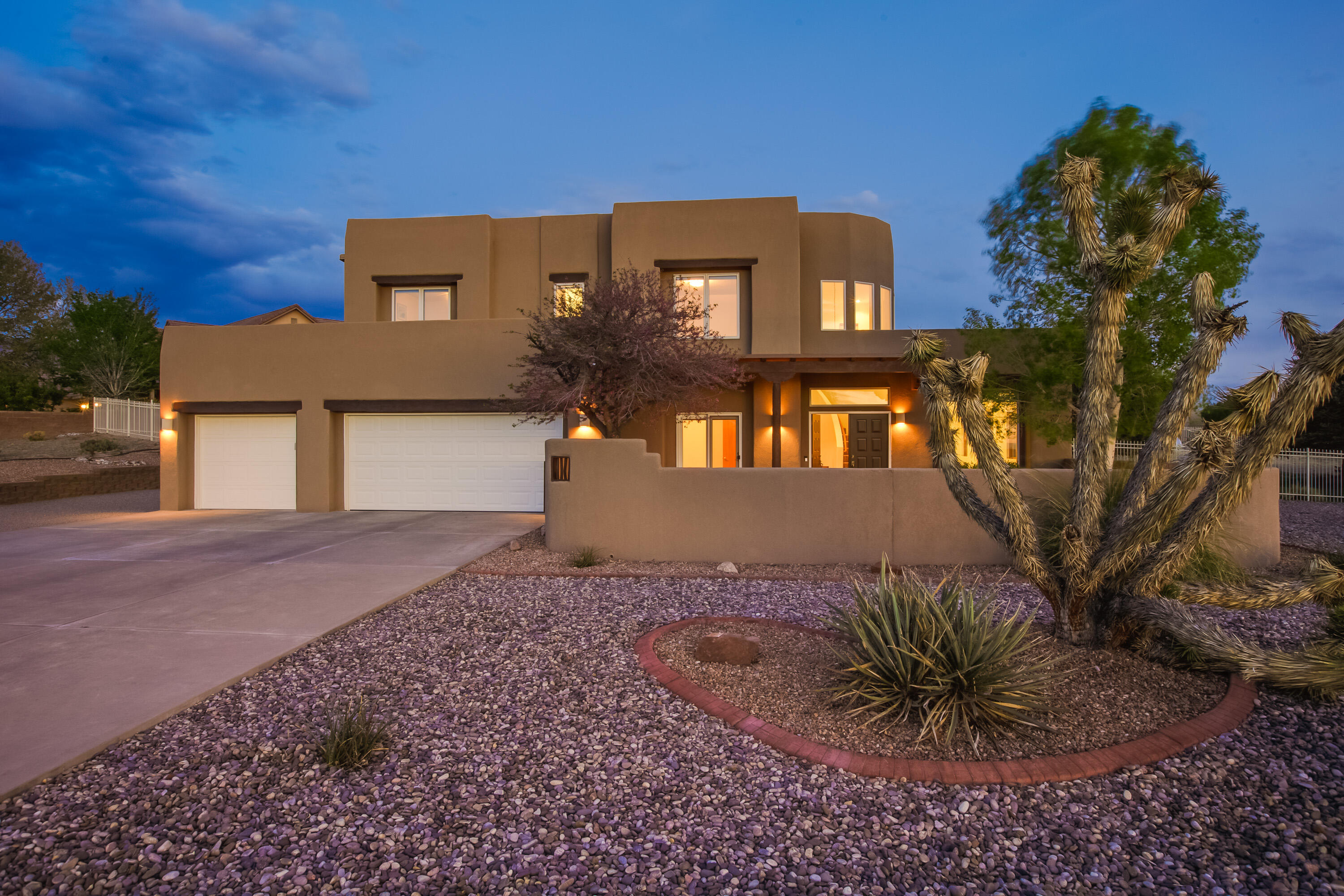 Located in North Albuquerque Acres, this two story Scott Patrick home offers a classic and functional design. Meticulously maintained throughout, step inside to find soaring ceilings and light filled rooms. Separate entrance to a bedroom/flex space on the main level. Open floor plan offers 2 living spaces, dining room and kitchen w/island. Two sets of sliding doors take you to the extended covered patio for dining, entertainment and big views of the Sandia Mountains. Enjoy your private pool and hot tub with a gazebo. This well manicured property is completely fenced, & offers an oversized shed w/electricity. Back yard access. Room for your RV. The bedrooms are generous in size. The Primary suite offers a shadow boxed ceiling, window that fills the room w/natural light and balcony. All​​‌​​​​‌​​‌‌​‌‌‌​​‌‌​‌‌‌​​‌‌​‌‌‌ in