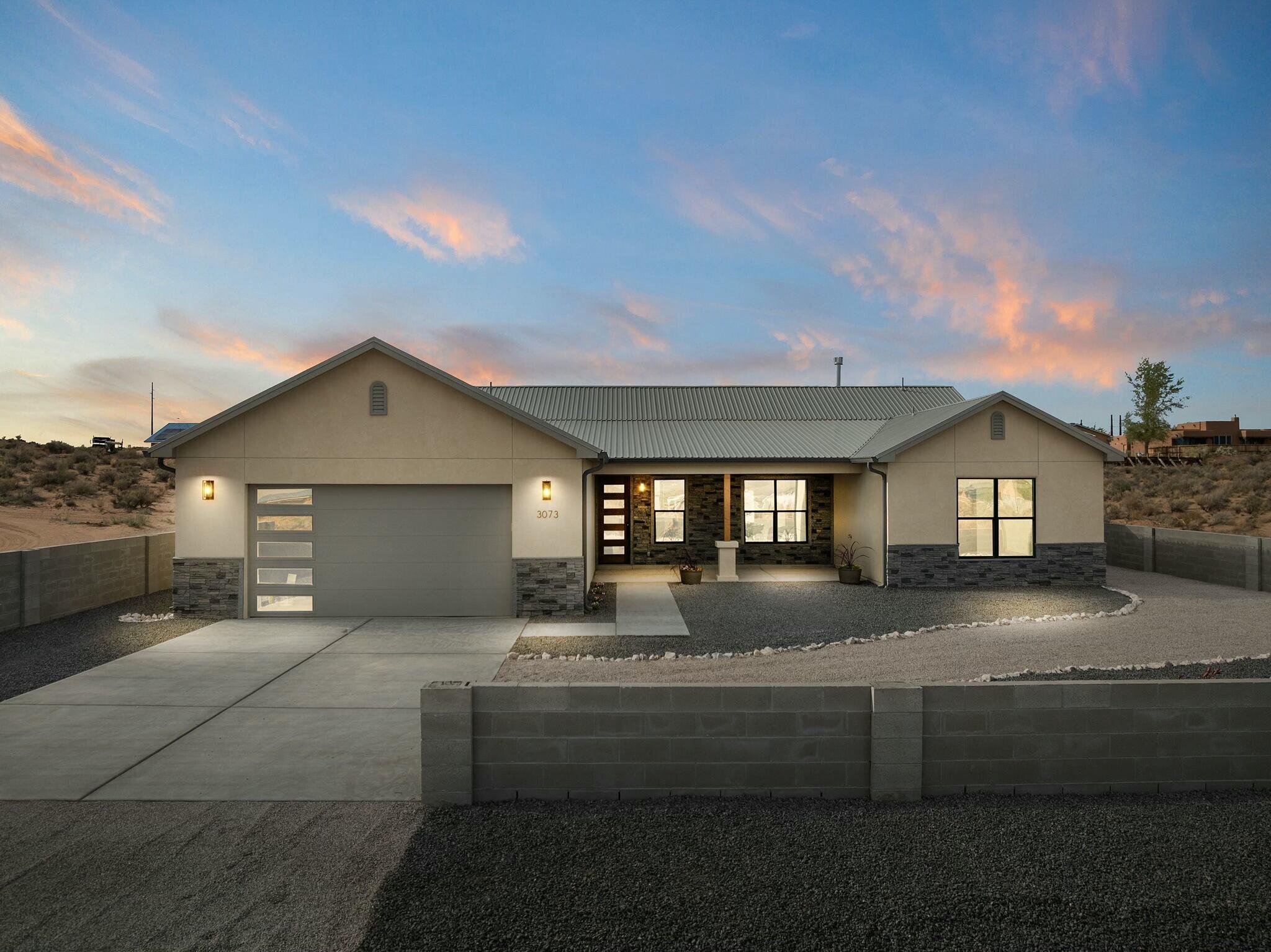 Welcome to your ideal home, where modern design meets everyday convenience located near schools, parks, restaurants, and shopping! This beautifully crafted property features stunning mountain views right from the front yard, creating the perfect backdrop for daily sunsets and peaceful mornings. The spacious open floor plan boasts a chef's kitchen with custom cabinetry, a statement island, and designer tile work. Cozy up by the stone fireplace in the inviting living room or retreat to the luxurious primary suite with a spa-inspired bathroom. Situated on a large, fully fenced lot with plenty of space to make your own, this home offers both privacy and breathtaking natural beauty. Experience refined living with all the comforts of a new, thoughtfully designed build and unforgettable views!
