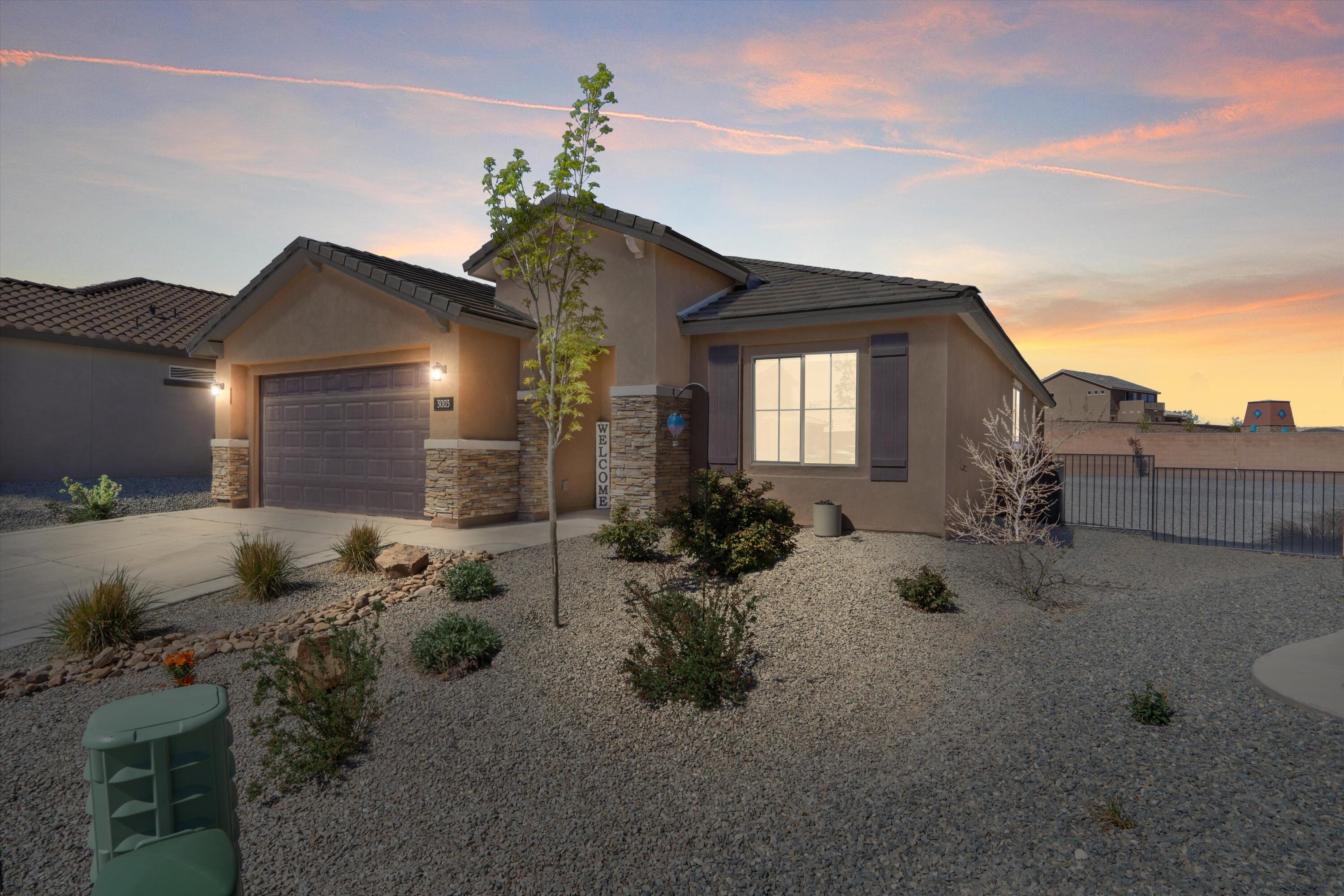 $5000 Buyer Incentive! Why wait to build? Welcome to this stunning, move-in-ready home offering 2,041 square feet of upgraded living space. The spacious open floor plan features a chef's kitchen with high-end appliances, a large island, and extended cabinetry. The master suite is a true retreat, with bay windows and a walk-in closet. Enjoy outdoor living with an extended covered patio, complete with a gas connection. Additional upgrades include epoxy-coated garage floors, pendant lighting, a widened driveway, tile floors, 8-foot doors, raised bathroom cabinets, and much more.