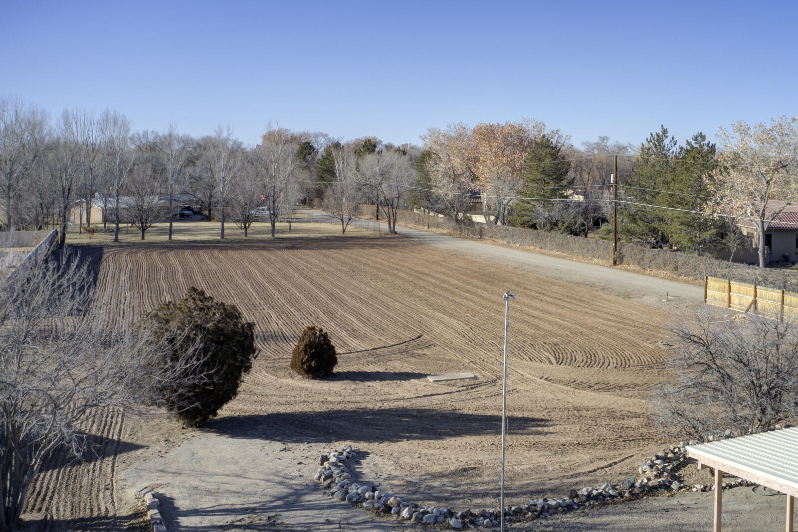 BACK ON THE MARKET! Fantastic 1 1/2 Acre in Prime North Valley Location. Being Sold as Vacant Land, but it does have an old adobe home
