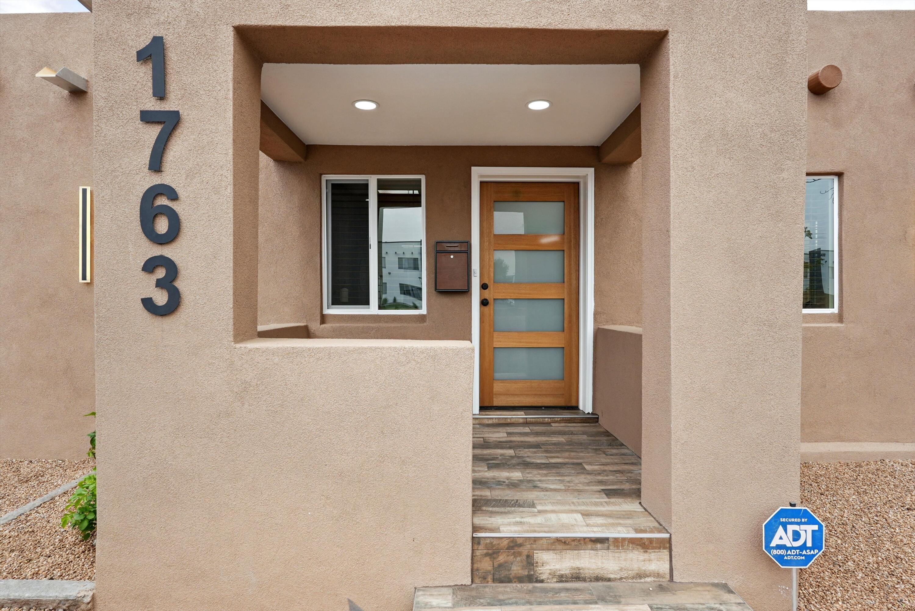 **SELLER WILLING TO BUY DOWN INTEREST RATE ONE FULL POINT!**Beautifully renovated home on huge lot in heart of Albuquerque's historic North Valley. The perfect blend of old-world charm & modern sophistication in a stunning 1936 original adobe home. Oversized kitchen features huge 10ft x 6ft center island, modern appliances, additional prep sink, undercounter cooler, new custom-built hardwood cabinetry w/ample storage, undercabinet task lighting, & beautiful quartz counters. New TPO membrane roof, new thermal-pane windows, weatherproof synthetic stucco, new central A/C and HVAC. Two new baths feature new plumbing, fixtures, tile and lighting. X-large utility rm w/more storage. Includes private detached studio/flex space. *On the right offer, lender participation and terms apply.