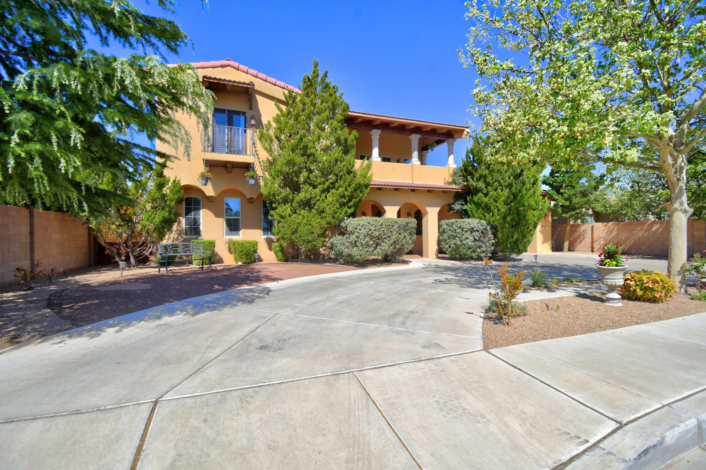 Welcome to this vibrant and impressive Mediterranean style home, where timeless elegance meets modern comfort. Nestled close  to the Bosque and just minutes away from St. Pius High School. This open concept gem offers vaulted ceilings with gorgeous exposed beams and an entertainers kitchen designed for gathering and making memories. Step onto the balcony to soak in breathtaking views of the  Sandia Mountains or unwind on the private patio for quiet evenings. This spacious primary en suite is your personal retreat, complete with a luxurious jetted tub. This home is perfect for making memories , Cease the opportunity  to make it yours !