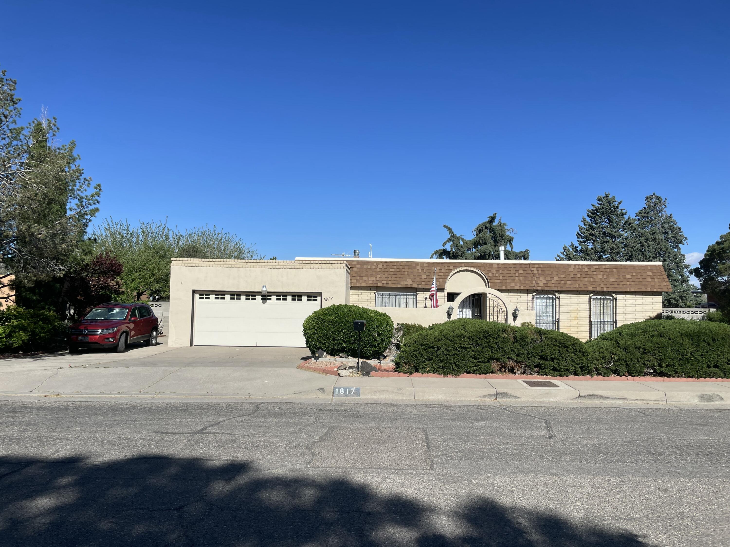REDUCED! This serene custom home, original owner, is on the market for the 1st time since 1971. Home sits on a non-thru street in a mature neighborhood on a lovely lot. Gorgeous mountain sunrise views w/ low maintenance xeriscaped front and terraced back yard on 1/4+ acre lot - garden plots and fruit trees. Enjoy extra long additional driveway for vehicles or RV. Solid, well maintained home in great condition needs some cosmetic updates to make it shine. Formal living/ dining, great room and large bonus room (319 not included in sq. ft.) would make an attractive flex space. Large garage, workshop and storage room. Water heater ('24), roof ('18), bidet ('24). Generous 21X9 covered back patio w/ outdoor grill and privacy walls make this backyard a 10.  Sunny home w/ endless possibilities!