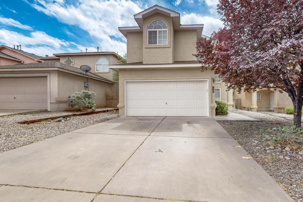 Super location in the NE heights! New roof with transferable warranty, new flooring, new stainless appliances, fresh stucco coat, new interior and exterior paint, new light fixtures, refreshed cabinets, breakfast bar in kitchen, gas log fireplace, balcony with nice mountain views too! Primary bedroom with huge walk in closet and jet tub! Minutes from North Domingo Baca Park featuring dog and skate parks, tennis and bocce courts and a mulitgenerational center too! Fire dept behind home (across street) but cannot run sirens until they are out of the neighborhood!