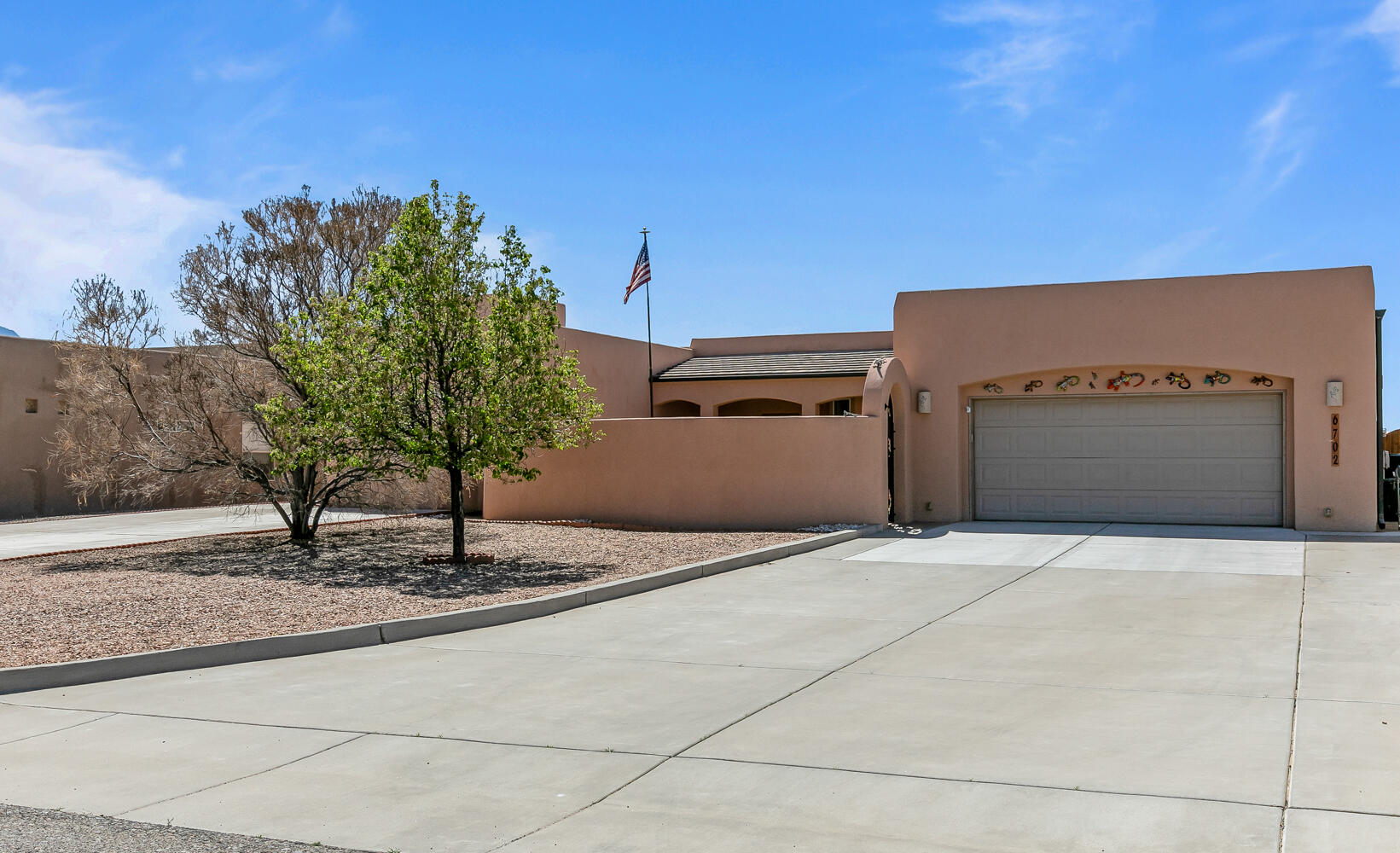 New Price! Welcome to this extraordinary VIEW property located in the Vista Entrada. This stunning home features 3 bdrm, office, heated sunroom & more! A true chef's kitchen is equipped w/ professional-grade six-burner Viking 60'' range, w/griddle & grill & is complemented by two pantries for all your culinary needs. Equally impressive is the 60'' stainless range hood. All-tile flooring provides seamless flow of the floorplan & skylights flood the home w/ natural light.  Views of the Sandias can be enjoyed from INSIDE & out. Relax in the yard with syn lawn, fire pit & low maintenance landscaping.  Cool off in  the luxurious saltwater solar-heated pool w/ in floor cleaning system, auto cover & safety fencing,  800 SF 2 car garage + RV pad with hookups. Make appt to see today!