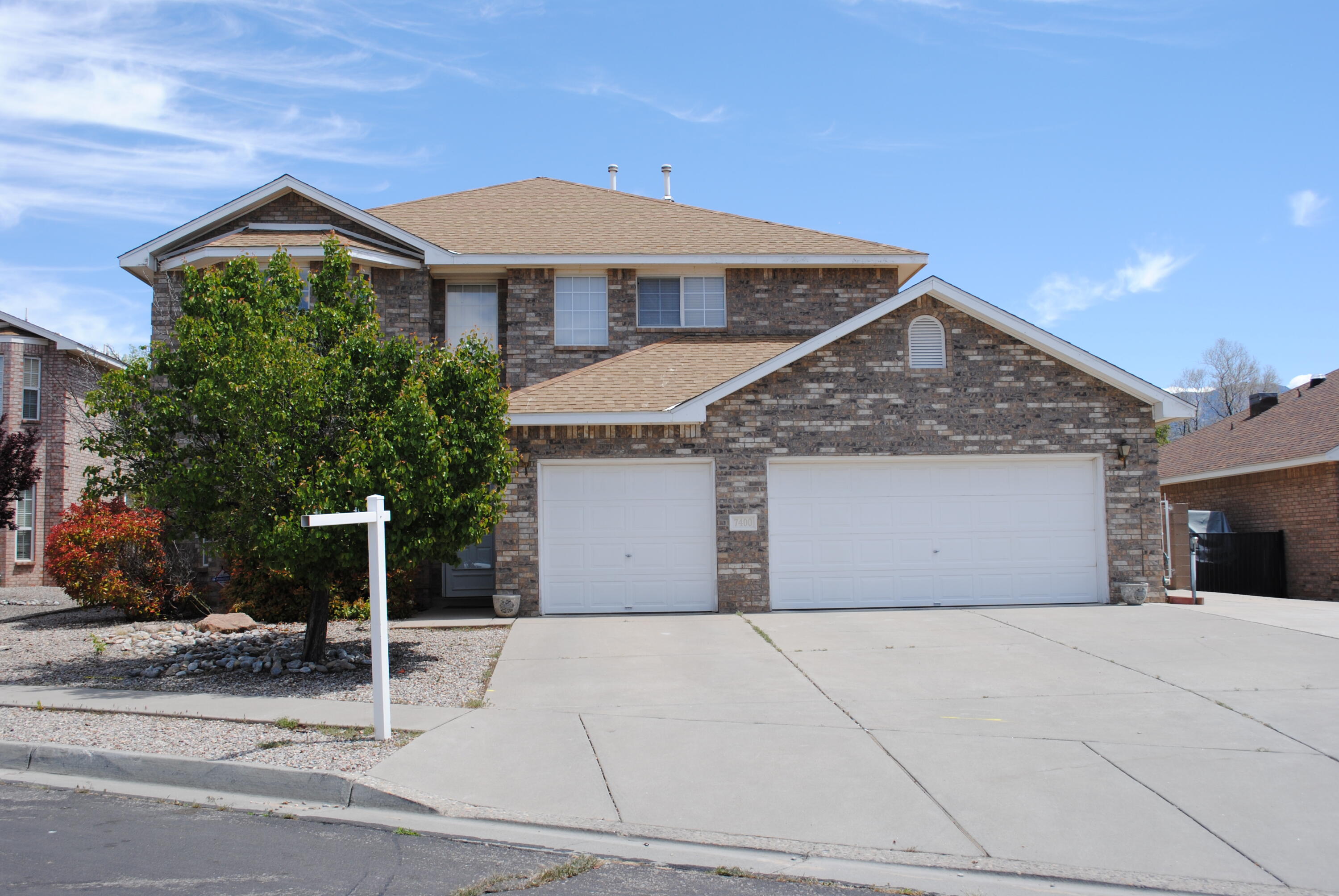 Room for the large family and their toys. Large, all brick, 5 bedroom + office home. Attached 3 car garage and 1 car detached garage with additional loft storage space. Backyard access with lots of paved area. Covered Patios & balcony overlooking large yard. Kitchen with an incredible amount of counter space, loads of cabinets and a pantry. Granite counters, electric cooktop and wall oven/microwave space. Kitchen looks out to the great room with custom fireplace and 18ft ceilings. Downstairs bedroom plus 3/4 bath is great for guests and extended family. 4 bedrooms upstairs including master with balcony. Additional bedrooms are roomy and 2 have very generous closet space. Ideal for work from home and the bonus garage is great for the hobbyist, car person, craftsman or just extra storage.