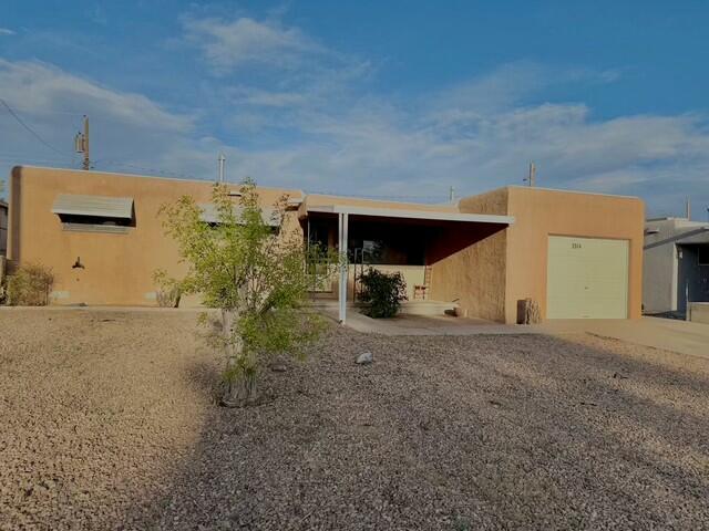 This 3-bedroom, 2-bathroom home in Albuquerque's Northeast Heights is just minutes from trails, lively shops, and restaurants. The interior features durable, easy&#8209;care tile flooring throughout, creating a clean and cohesive look from room to room. A newer roof installed in 2023 also comes with a transferable warranty, offering peace of mind for years to come.