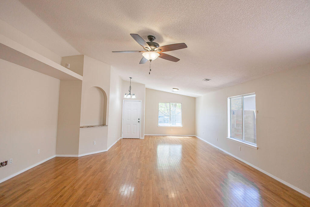 Beautifully updated 4-bedroom, 2.5-bathroom home with 2,155 square feet of comfortable living space, built in 2000. This spacious residence features a modern kitchen with granite countertops, upgraded sink, faucet, and disposal. Granite accents continue in the downstairs bathrooms and custom nichos, adding a touch of elegance throughout.The home boasts new tile in all bathrooms, new carpet and flooring in the bedrooms, and rich hardwood in the main living areas. Freshly painted inside and out, the home feels clean, bright, and move-in ready. Major system upgrades include a brand-new roof, new water heater, new refrigerated A/C unit, new furnace, and all-new light fixtures.Every detail has been thoughtfully considered, blending style, comfort, and peace of mind in one beautiful