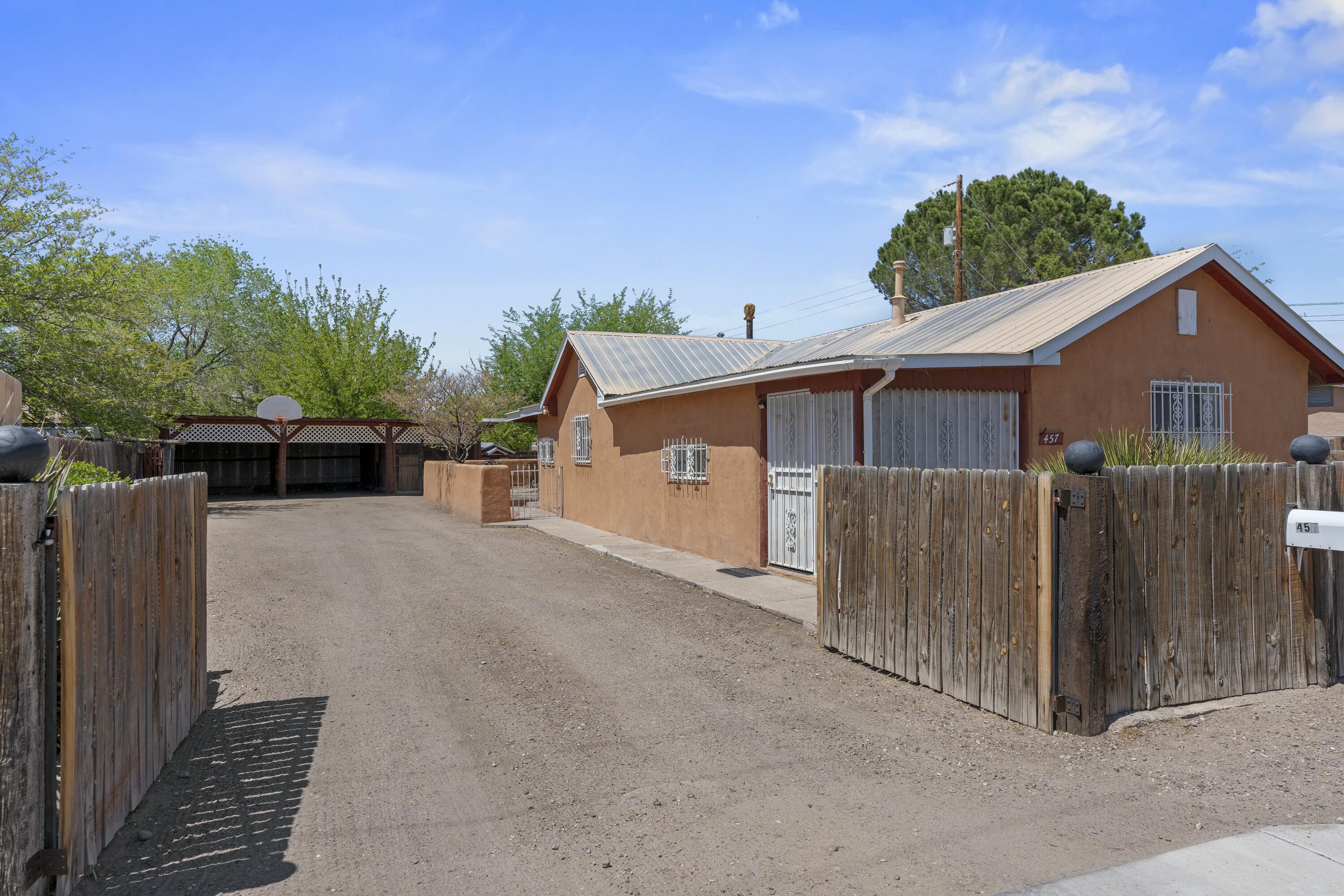 Welcome to this 3-bedroom, 1-bath home with a versatile flex room--perfect for a home office, guest space, or creative studio! With 1,358 square feet of living space on a 0.18-acre lot, this property offers both comfort and potential. The kitchen comes equipped with a refrigerator and stove, and there's place to install a cozy fireplace to enjoy. Freshly touched-up paint adds a clean, inviting feel. Sold as is, this home is full of opportunity to make it your own. Come explore the possibilities and imagine the lifestyle you can create here!
