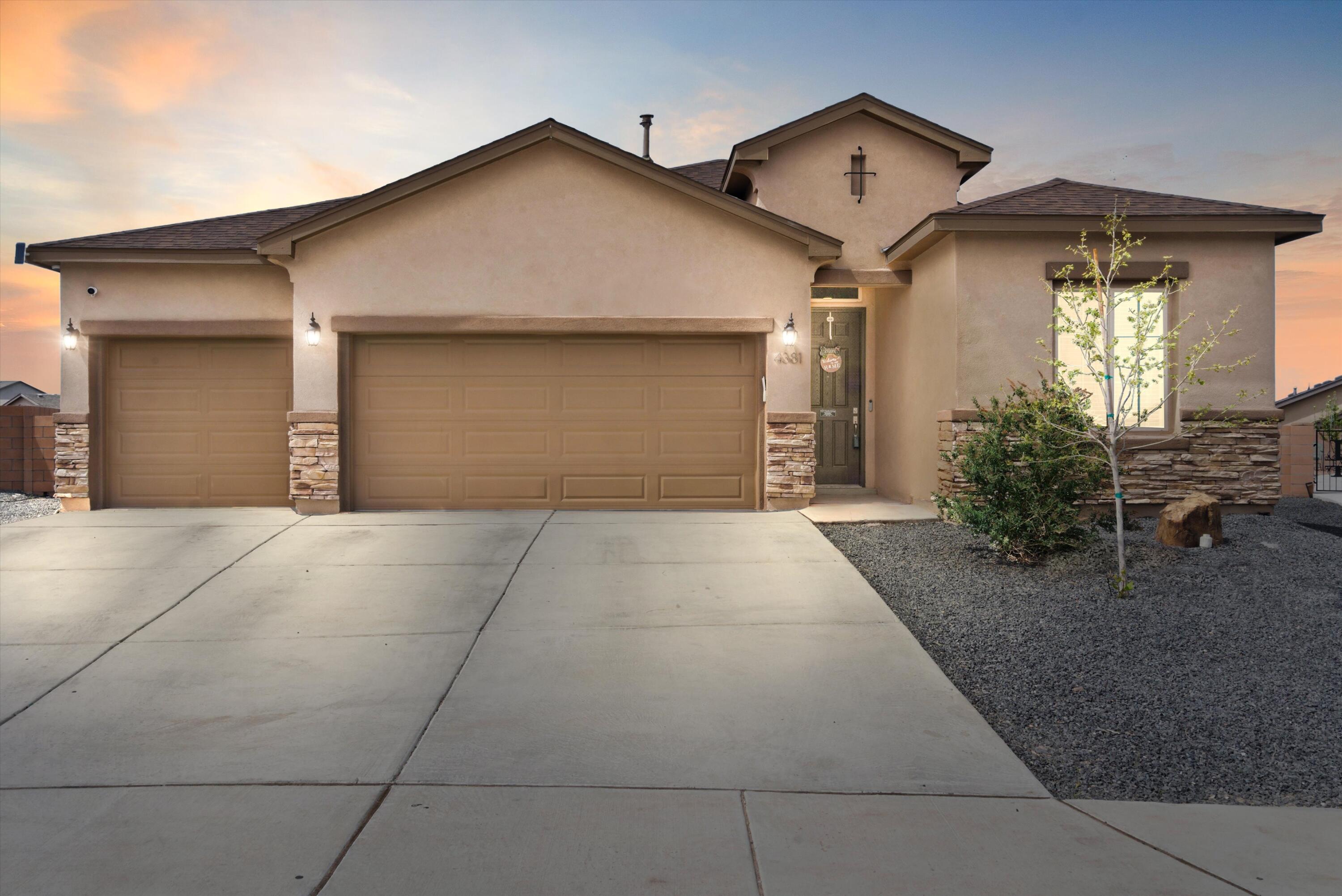 This stunning 5-bedroom, 3-bathroom home welcomes you with 8-foot doors, refrigerated A/C, and beautifully hand-troweled walls. The heart of this home is the chef's kitchen, featuring high-end appliances, granite countertops, and a large island - the perfect space for entertaining and creating lasting memories with loved ones. Elegant tray ceilings and a luxurious shower cove add a touch of sophistication to the interior. Built to a Build-Green NM Silver standard, this home also boasts energy-efficient Low-E thermo windows and a 3-car finished garage. Beyond the exquisite interior, an ''open-air recreation zone'' awaits, ideal for gaming or stargazing under the vast New Mexico sky, or simply unwind under your extended covered patio! A perfect blend of elegance and functionality!