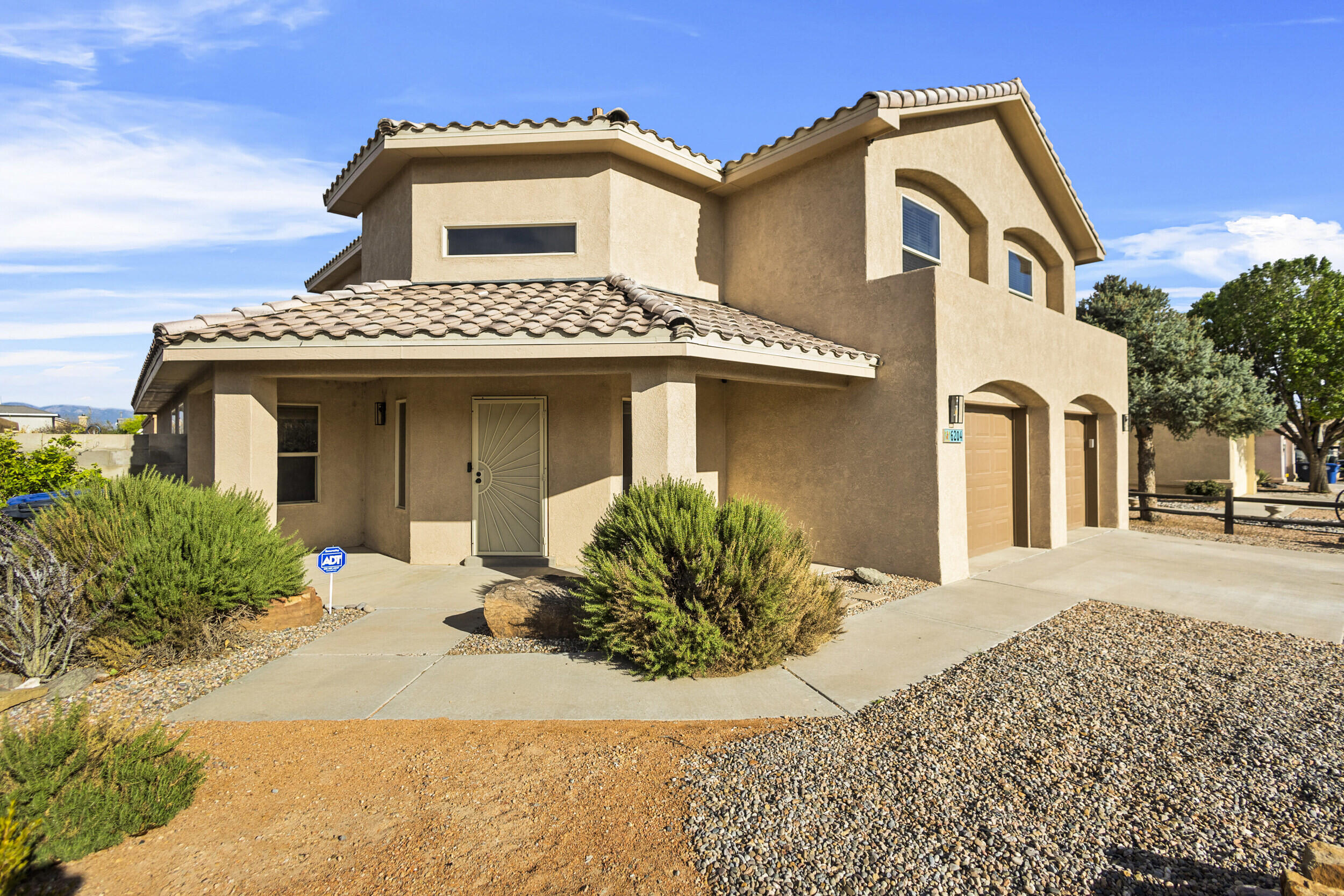 This beautifully updated home offers a spacious layout and recent upgrades throughout. A stunning two-story entryway with a double staircase welcomes you inside. The main level features new wood-look tile flooring and a remodeled kitchen with updated cabinets, countertops, and backsplash. The open layout flows into the living area with a cozy fireplace.Upstairs, the oversized primary suite includes a sitting area, its own fireplace, and a huge 2-person shower. Step out onto the second-story deck to enjoy breathtaking mountain views. Additional updates include a remodeled bonus room and a new HVAC system. Move-in ready and packed with upgrades!
