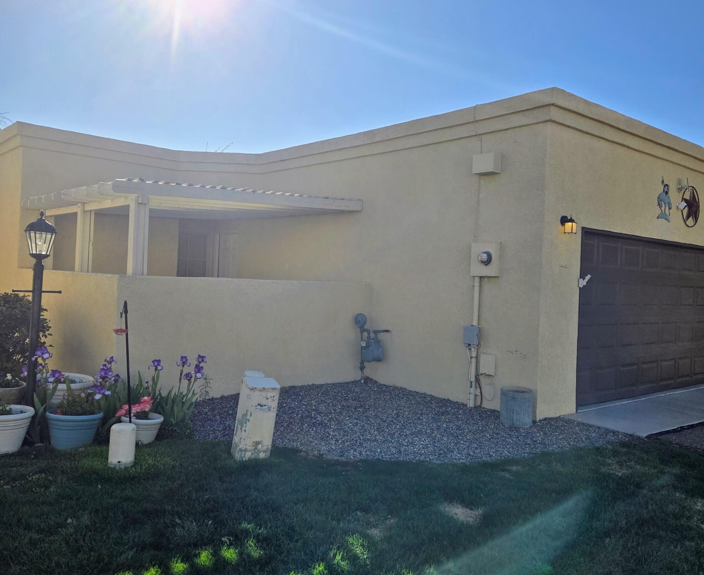 Fabulous Townhome in 55+ Desired Neighborhood. Light & Bright Open Floorplan. Quartz Counter tops, Subway Tile Backsplash, Laminate wood flooring, Gas Fireplace. Private Patios off  of Both Bedrooms. Master Cool Unit, Built in Bookcase, Extra Flex Room just to name a few. Located on a private low traffic Cul-De-Sac. This home shows pride of Ownership & Will Not Disappoint!