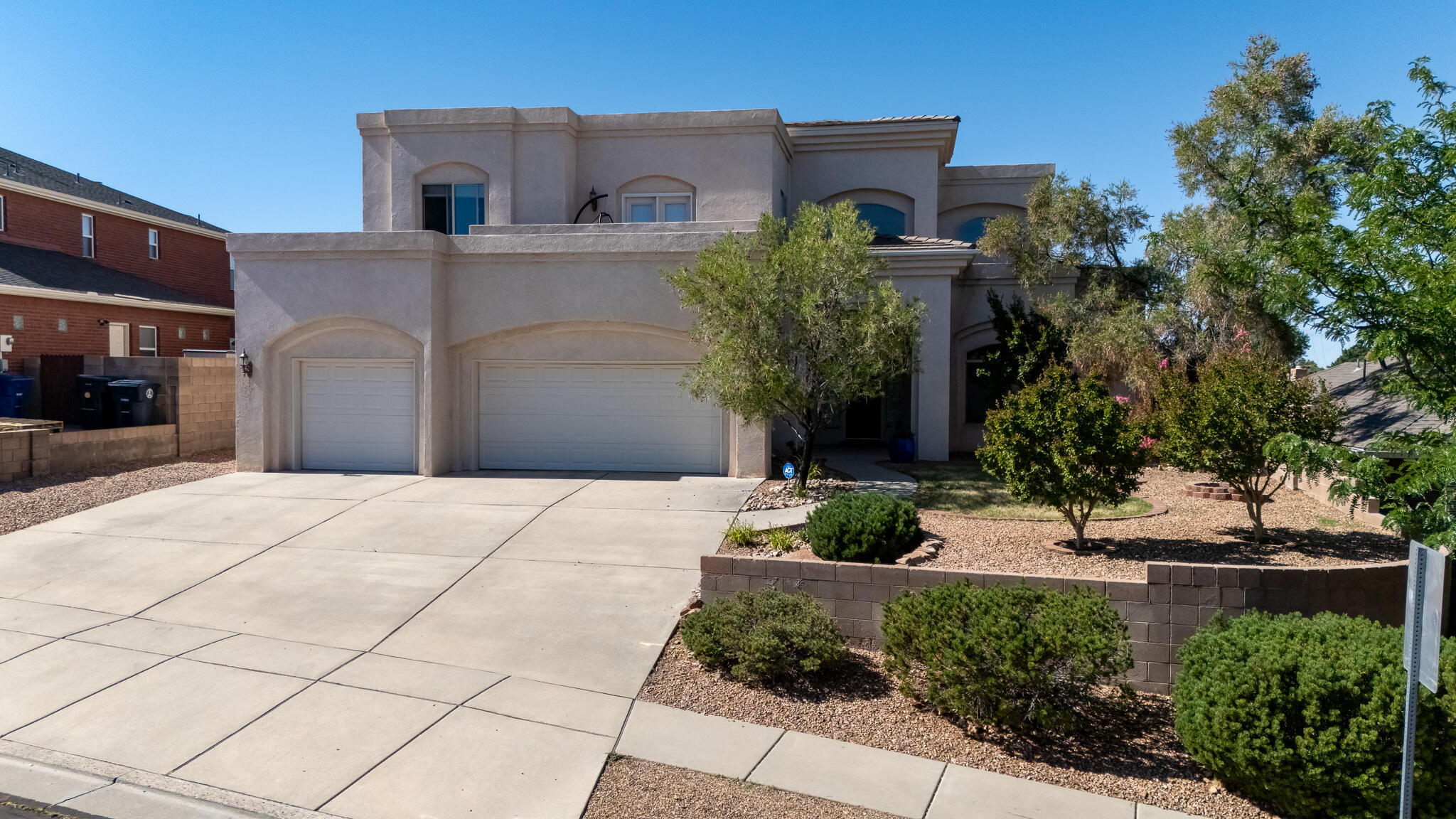 Come & see this Panorama custom home with views from every room in the highly desirable QUINTESSENCE neighborhood! Custom mirrors, Arched doorways, passageways allow you to flow through your home with comfort! Your large kitchen has ample cabinet space, walk in pantry, breakfast nook with beautiful granite counter tops! Separate formal dining room, in law suite/office with a 3/4 bathroom completes your main living area! As we head upstairs to your large family, two balconies front & back with the stunning unobstructed Sandia and city views! two great sized rooms that are split by a jack & Jill bathroom! Primary suite with so much to offer! Your backyard is made for entertaining, with covered & open patio's with direct access to a walking path! Schedule today to view this immaculate home!