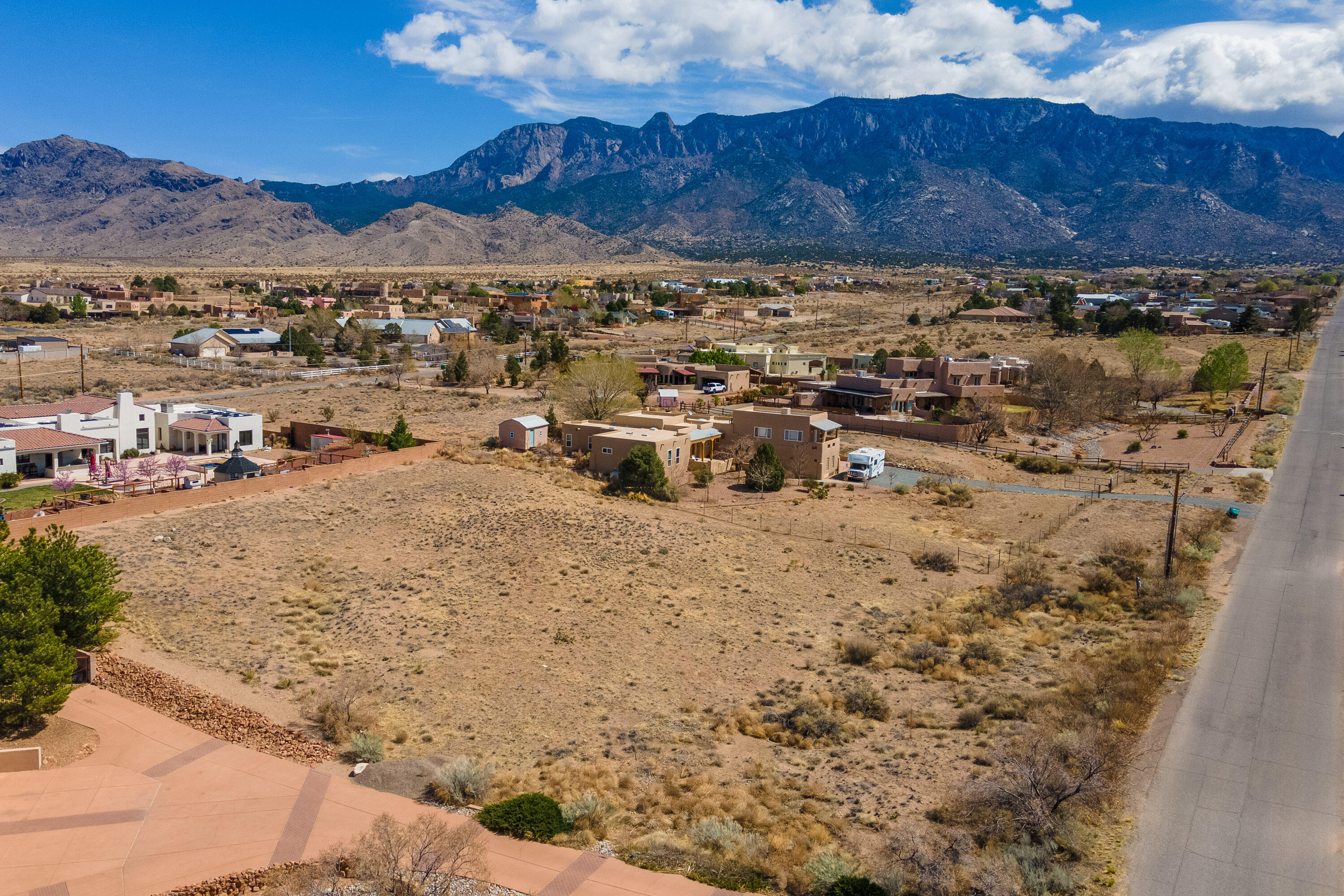 This is a beautiful building lot in the high desirable North Albuquerque Acres area. Located on the north side of Modesto with spectacular Views of the Sandia Mountains Amazing NAA lot to build your dream on. This lot is a county approved hydrology waiver lot. You can build almost anywherewithin the setbacks.  Buyer to verify with county.
