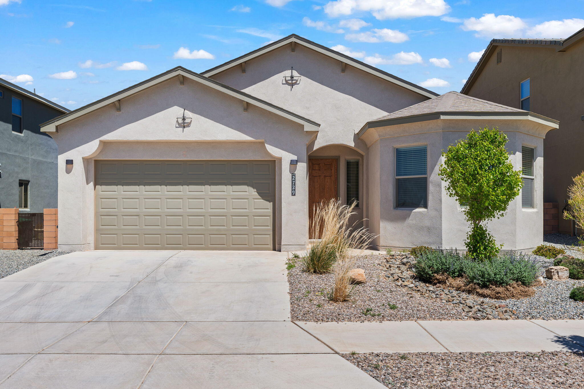 Welcome to this beautifully maintained single-story home featuring 3 spacious bedrooms, 2 full bathrooms, and an attached 2-car garage. The open-concept layout creates a warm and inviting atmosphere, ideal for both everyday living and entertaining. The modern kitchen includes sleek stainless steel appliances, perfect for home cooking and hosting. The expansive primary bedroom is a true retreat, complete with a huge walk-in closet and ample space to unwind. Step outside to enjoy the 10' x 25' covered patio -- perfect for outdoor dining or relaxing year-round. The low-maintenance backyard offers beauty and function without the hassle, making it ideal for busy lifestyles.