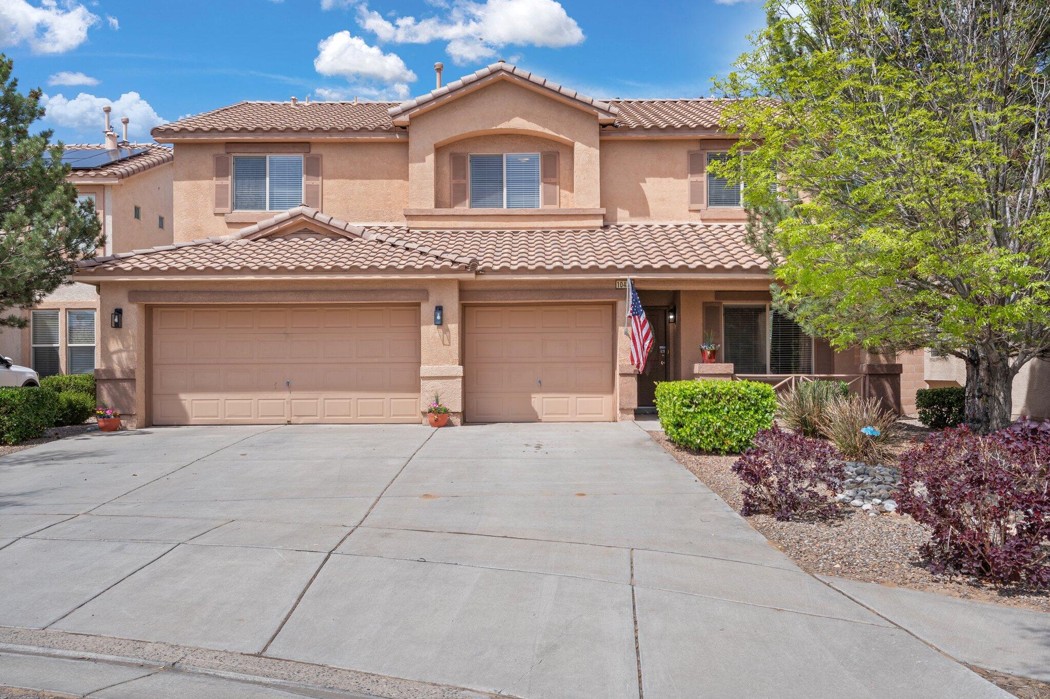 This one is going to go fast! Beautiful two story four bedroom home has fresh paint and many upgrades.  Beautiful views of the Awesome NM sunsets from your covered back patio. Mature trees and drip system . This open floor plan has formal living room with laminate flooring that flows into the kitchen /Family room with tile floors. Stainless steel appliances, tile backsplash walk in pantry, recessed lighting ,large island and storage galore.  Three car garage and a doggie door ! Most rooms have ceiling fans and the home has 2 fairly new furnaces and refrig. Air units.