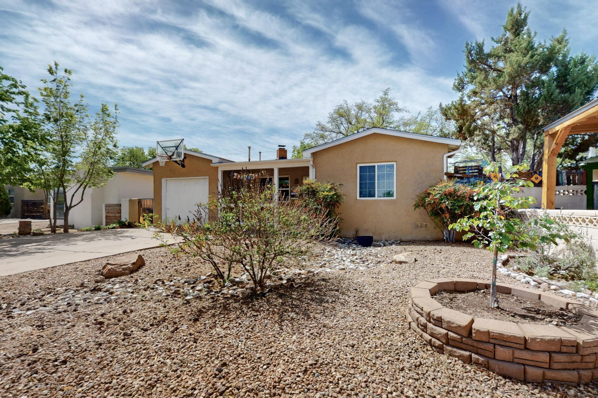 Welcome to this lovingly maintained and tastefully updated single-family home located in the heart of the desirable Parkland Hills neighborhood. Built in 1950, this warm and inviting residence blends timeless character with modern updates, offering 3 bedrooms, 2 full bathrooms, and approximately 2,027 square feet of comfortable living space. Step inside to discover gleaming hardwood floors, raised beamed ceilings, and sunlit rooms that create an inviting atmosphere throughout. The cozy family room features a pellet stove, while the adjoining dining room is anchored by a charming wood-burning fireplace, perfect for intimate gatherings. The remodeled kitchen is both stylish and functional, showcasing granite countertops, white cabinetry, and stainless-steel appliances, including...See More