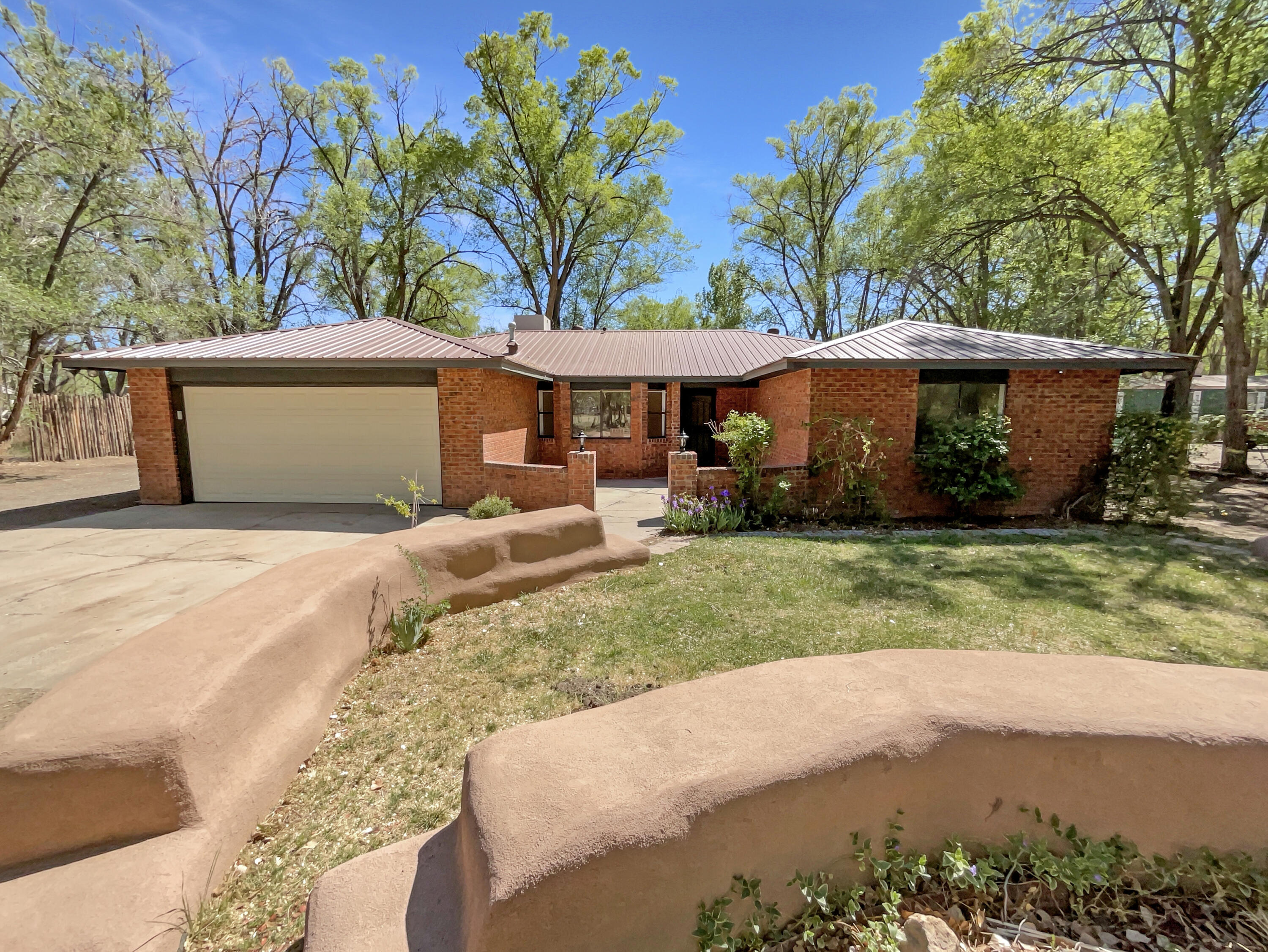 Fantastic home in sought after location! This home has Fresh Interior Paint. A fireplace and a soft neutral color palette create a solid blank canvas for the living area. Relax in your primary suite with a walk in closet included.  The primary bathroom features plenty of under sink storage waiting for your home organization needs. Take it easy in the fenced in back yard. The covered sitting area makes it great for BBQs! Like what you hear? Come see it for yourself!