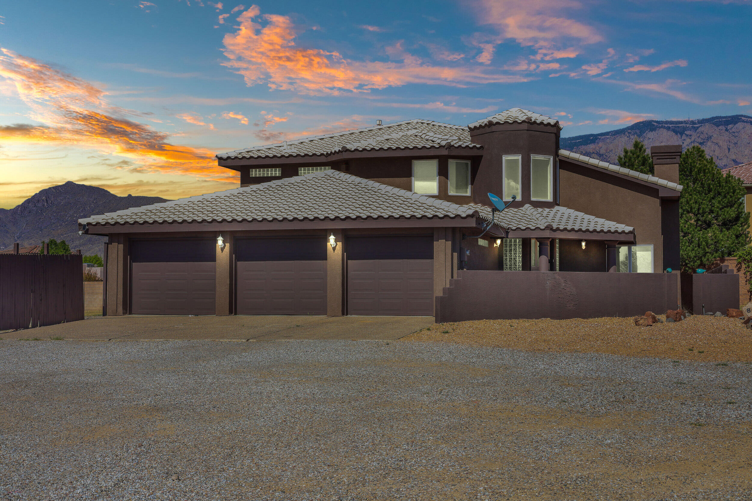 Step into timeless Southwestern charm with this beautifully designed 4-bedroom, 3-bathroom custom home, set on nearly an acre in the heart of North Albuquerque Acres. From the moment you arrive, a private courtyard entry welcomes you into a space filled with warmth, character, and endless potential.Inside, you'll find a spacious and functional floor plan highlighted by soaring ceilings, wood-trimmed windows, solid wood doors, and a mix of tile and hardwood flooring. The main living areas offer generous space for everyday living and entertaining alike, with formal living and dining rooms, a cozy gas fireplaces, and built-in cabinetry that adds both charm and storage.At the heart of the home is an inviting kitchen that's already been updated with granite countertops, modern