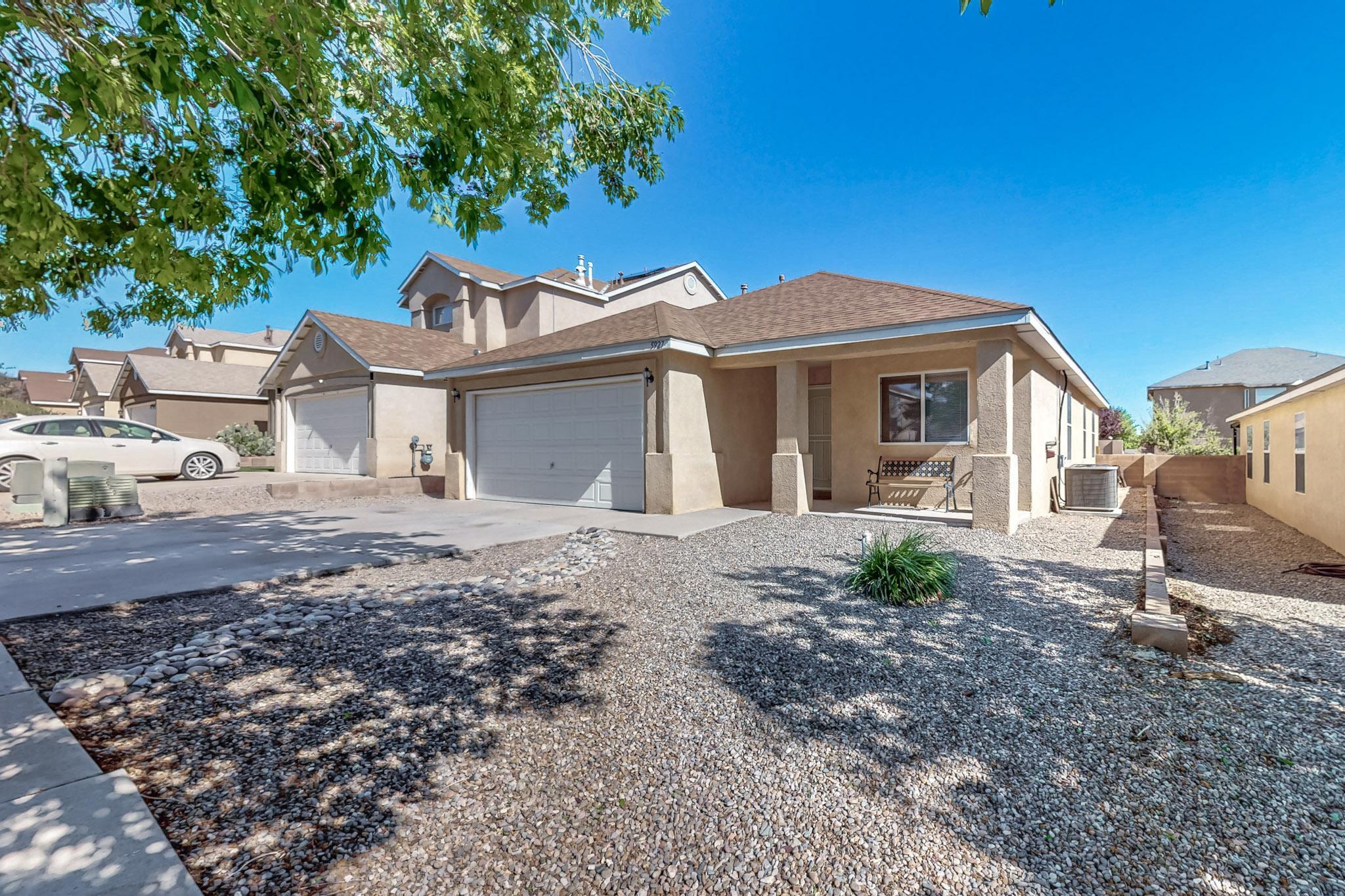 Step into this beautifully maintained 3-bedroom, 2-bathroom home nestled in a desirable Northwest Albuquerque neighborhood. This property is in great condition. Just unpack and start living!This home offers an inviting open-concept layout, perfect for entertaining and everyday living. The living room is bright and welcoming, with plenty of natural light and a seamless flow into the dining area and kitchen. The kitchen features ample counter space, plenty of cabinets, and modern appliances, making meal prep a breeze. The primary suite includes a private en-suite bathroom and generous closet space. Two additional bedrooms provide flexible space for guests, a home office, or hobbies.Additional features include central refrigerated air, a two-car garage, and a low-maintenance yard.