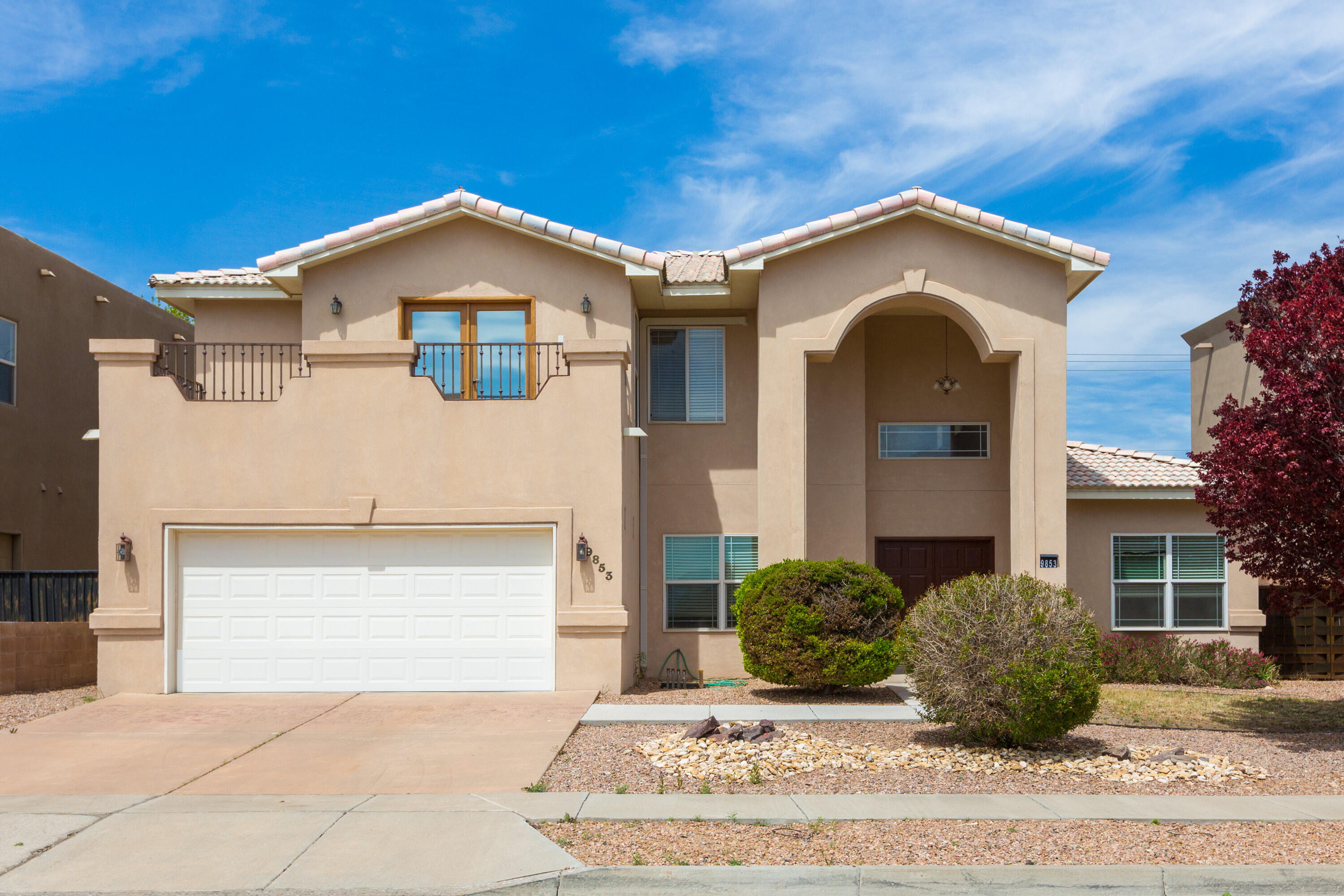 Welcome to This Stunning 4-bedroom, 3.5 bathroom Custom Home.  Enjoy the Stunning City and Sandia Views off the Primary  Bedroom  Deck.   Two Living areas  plus a bedroom and full bath downstairs. Ample cabinets and counter space with Corian countertops in the kitchen.  This Home offers radiant heat,  and Five mini splits for cooling. Spend joyful evenings in the Beautiful Easy to care for Landscaped  Backyard. Located in the desirable Knolls of Paradise neighborhood. Truly a Great Place to Call Home!