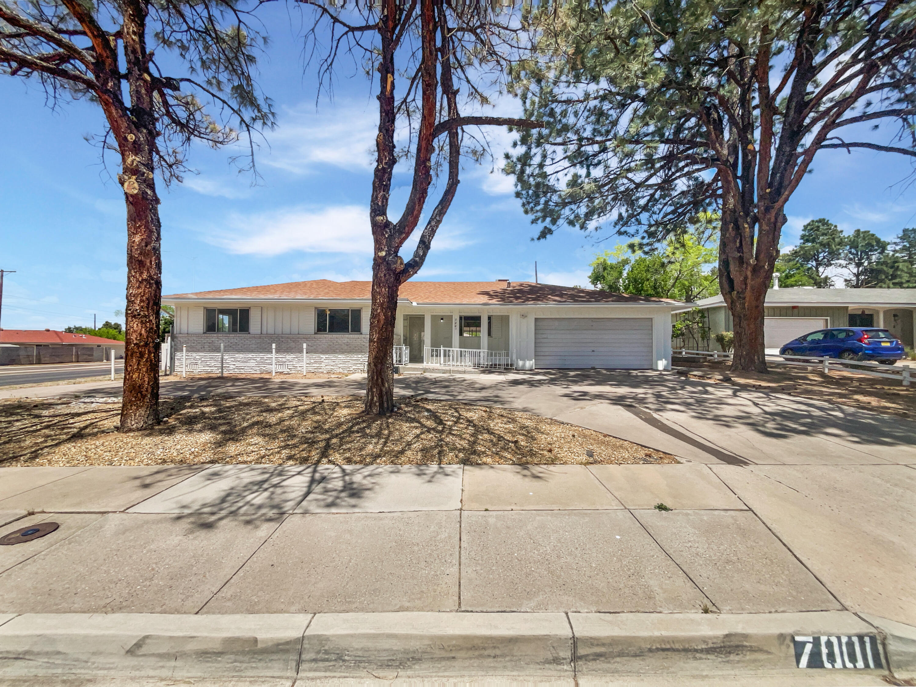 Check out this stunner! This home has Fresh Interior Paint, Partial flooring replacement in some areas. A fireplace and a soft neutral color palette create a solid blank canvas for the living area. Step into the kitchen, complete with an eye catching stylish backsplash. Relax in your primary suite with a walk in closet included.  Take advantage of the extended counter space in the primary bathroom complete with double sinks and under sink storage. Take it easy in the fenced in back yard. The covered sitting area makes it great for BBQs! A must see!
