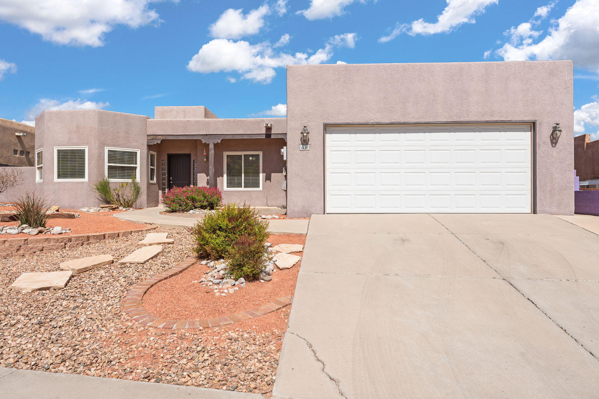Welcome to a charming haven in Albuquerque's desirable community! This beautifully maintained 3-bedroom & an office, 2-bath home offers an open floor plan that seamlessly connects the living, dining, & kitchen areas, perfect for gatherings. The bright & spacious kitchen includes stainless steel appliances & lots of storage. Primary bedroom has a separate entrance, fireplace, & a primary bath with separate shower & tub & a walk-in closet. 2 more rooms & a full bath to follow. Step outside to your private backyard oasis, complete with a spacious patio, a fireplace & your very own sauna. Enjoy the convenience of nearby parks, shopping, & top schools. With its inviting ambiance & modern touches, this home is ready for you to make it your own. Don't miss your chance--schedule a showing today!